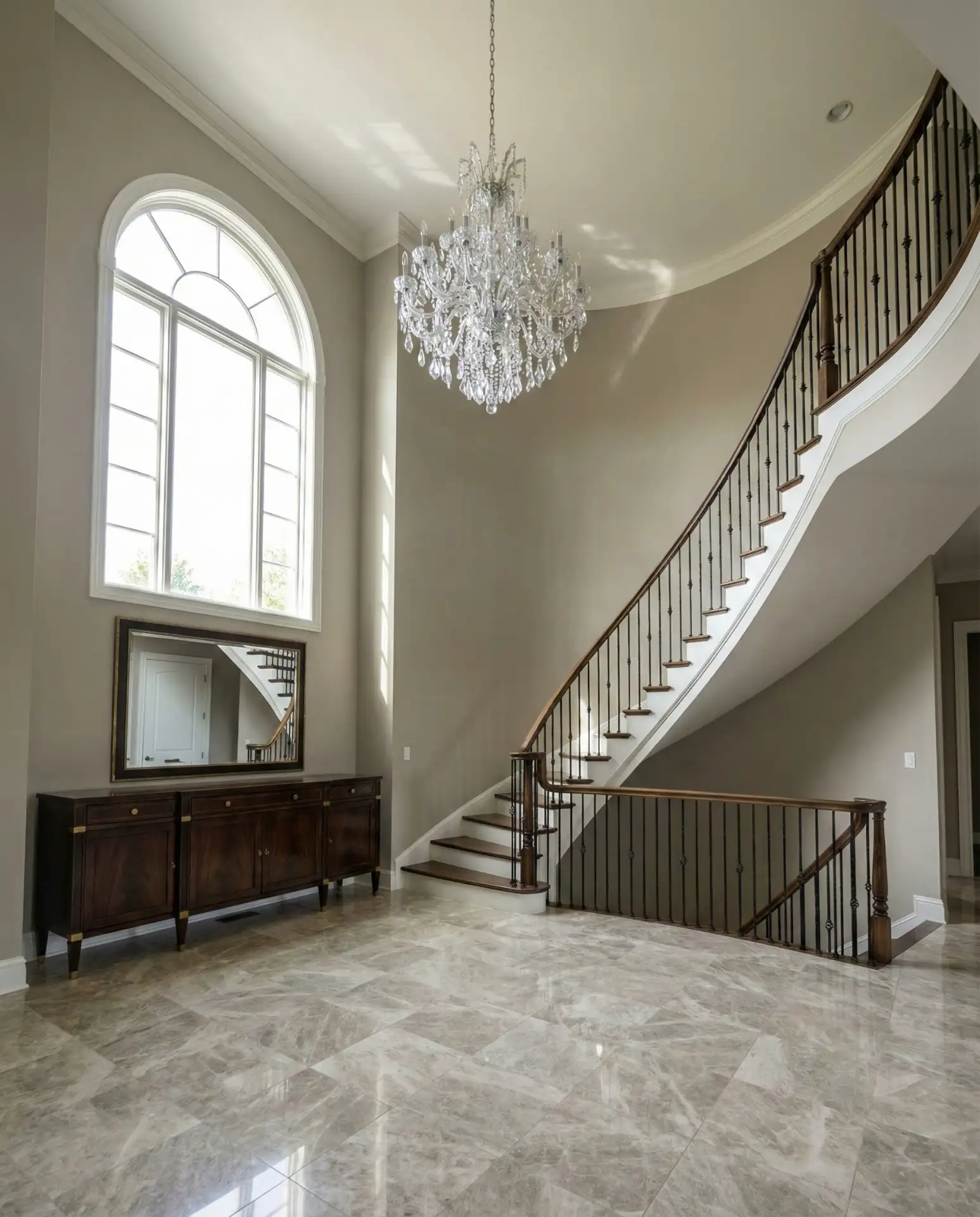 Double Height Foyer with Statement Chandelier 1