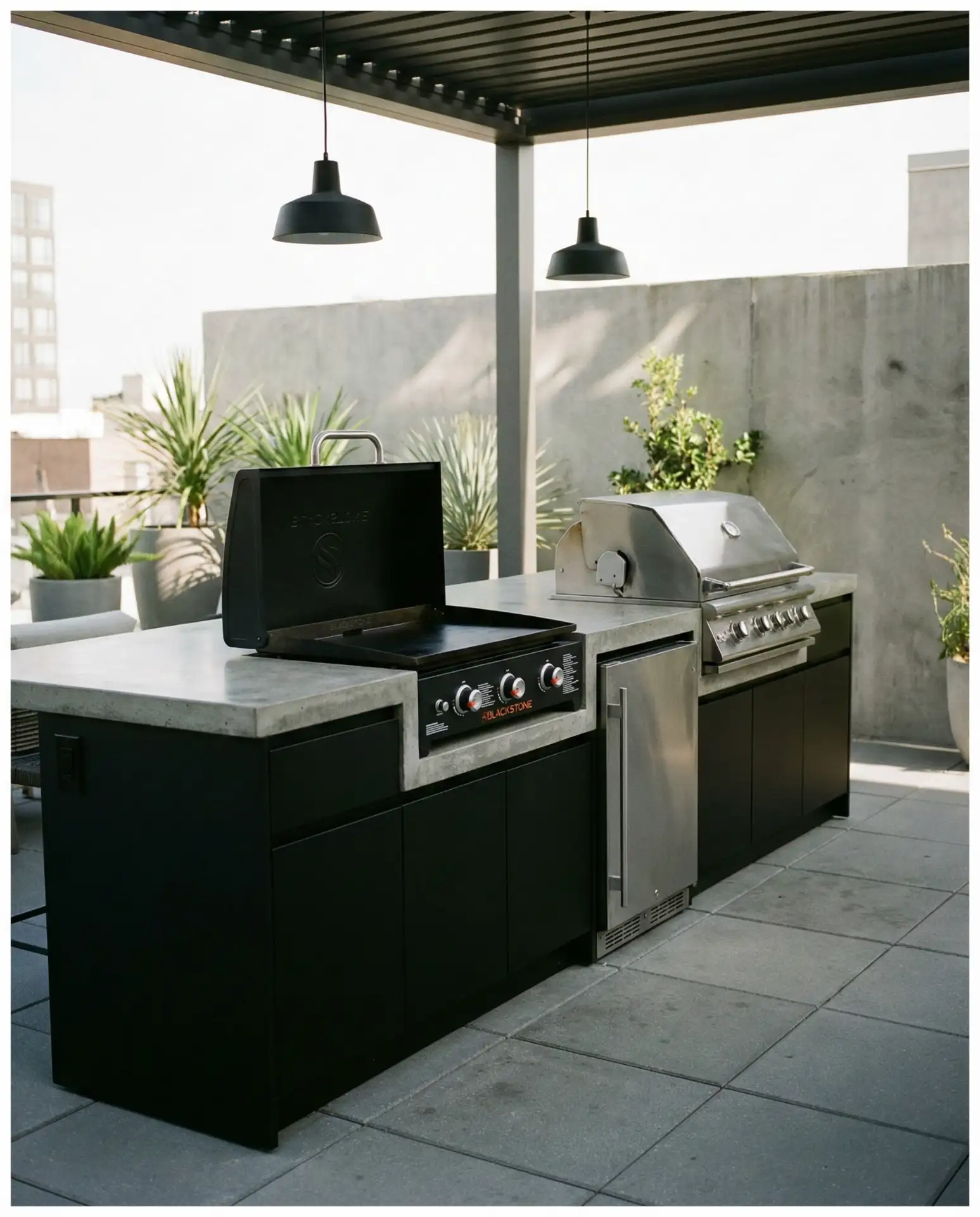 Modern Concrete Island with Integrated Blackstone Grill 2