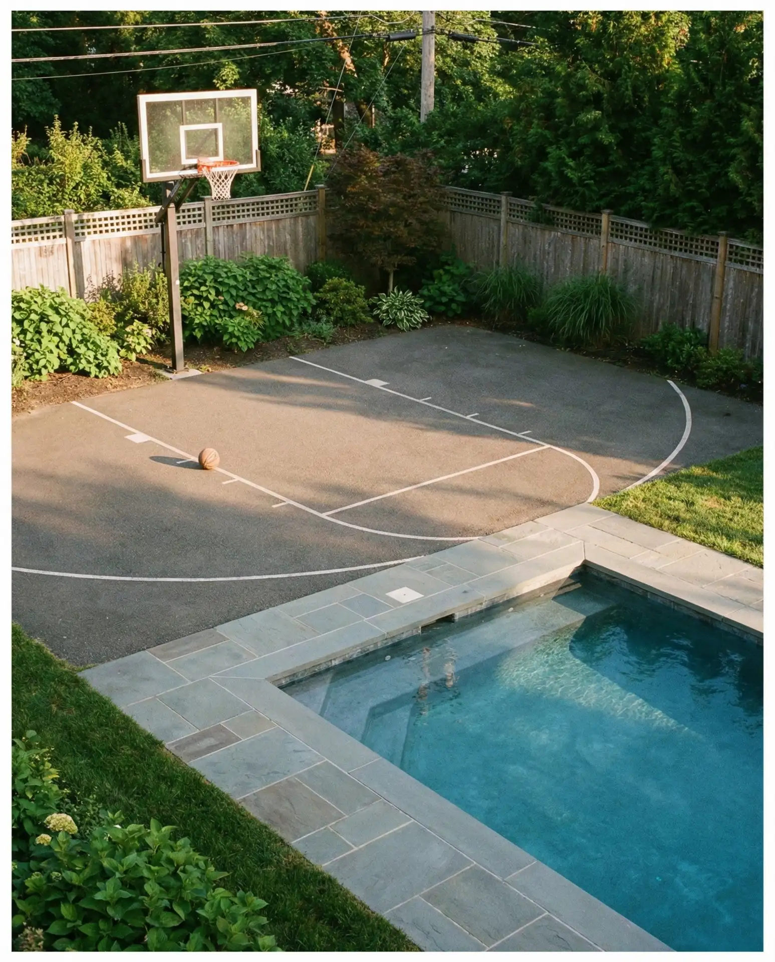 Pool with Adjacent Sport Court or Basketball Hoop 1