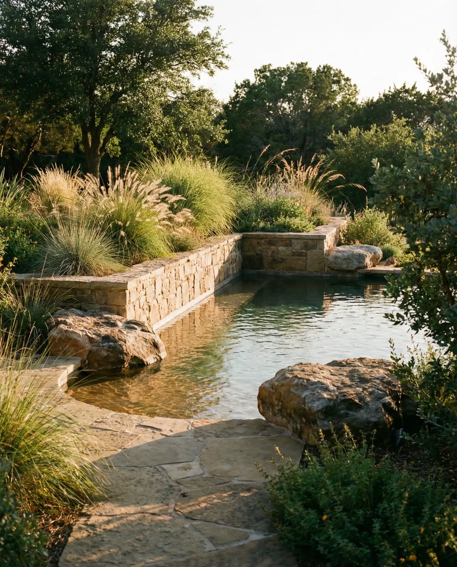 Pool with Integrated Planters and Rock Accents 1