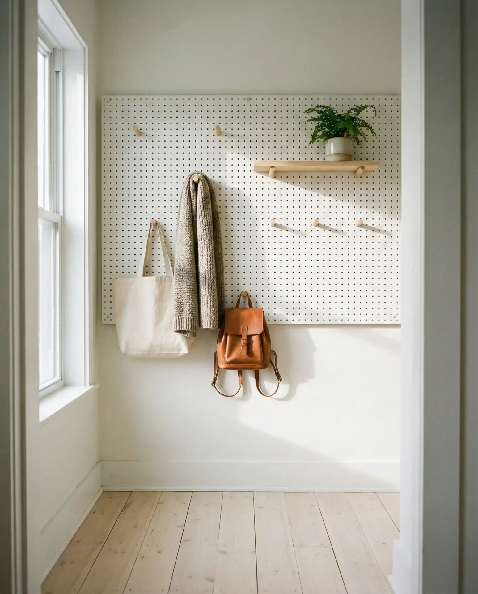 Scandinavian Flat Entry with Pegboard Storage 2