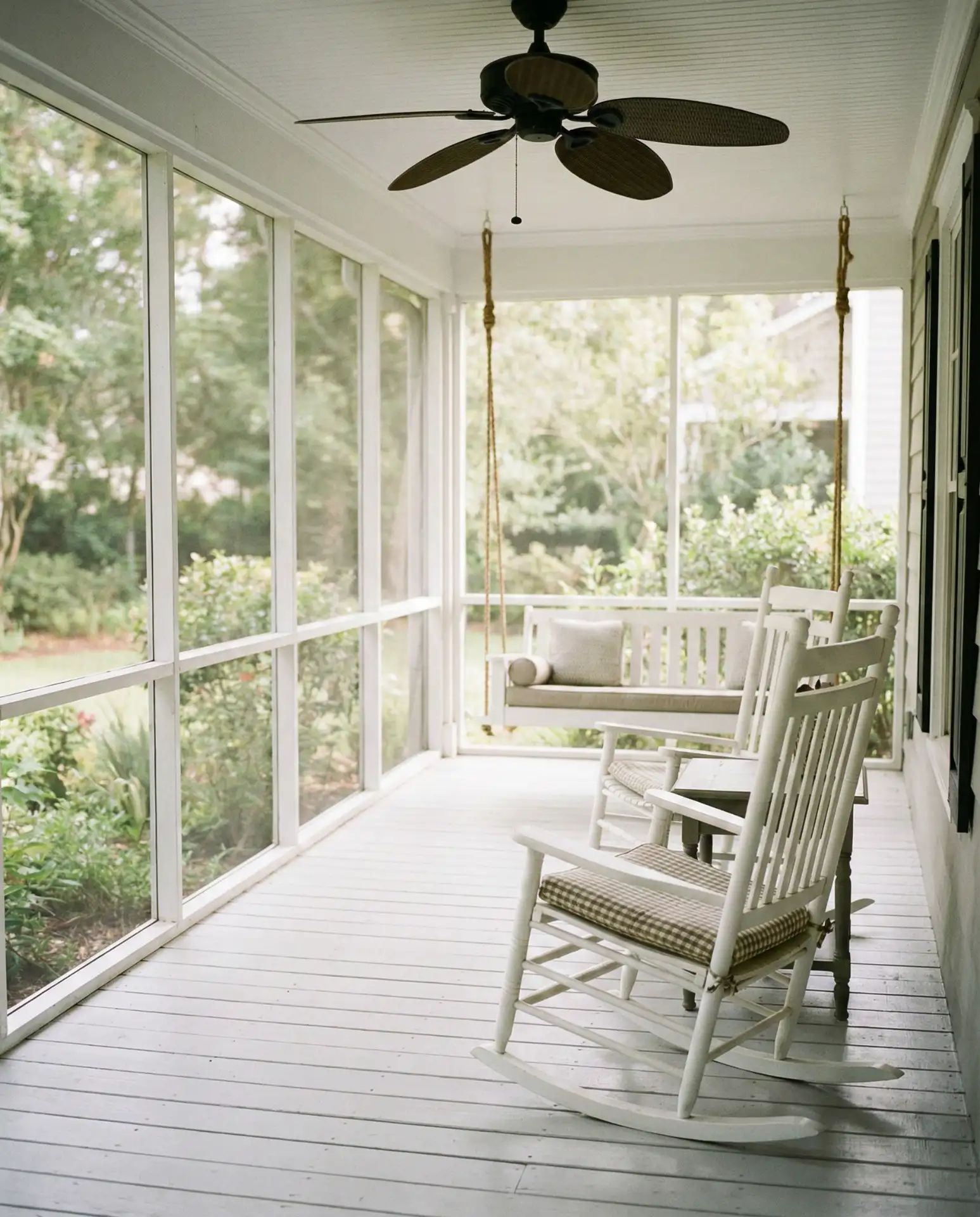Screened Porch with Rocking Chairs and Paddle Fan