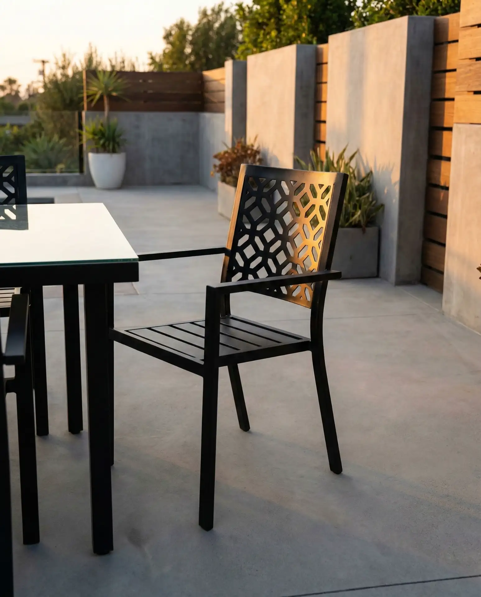 Sleek Aluminum Dining Chairs with Geometric Backs 2