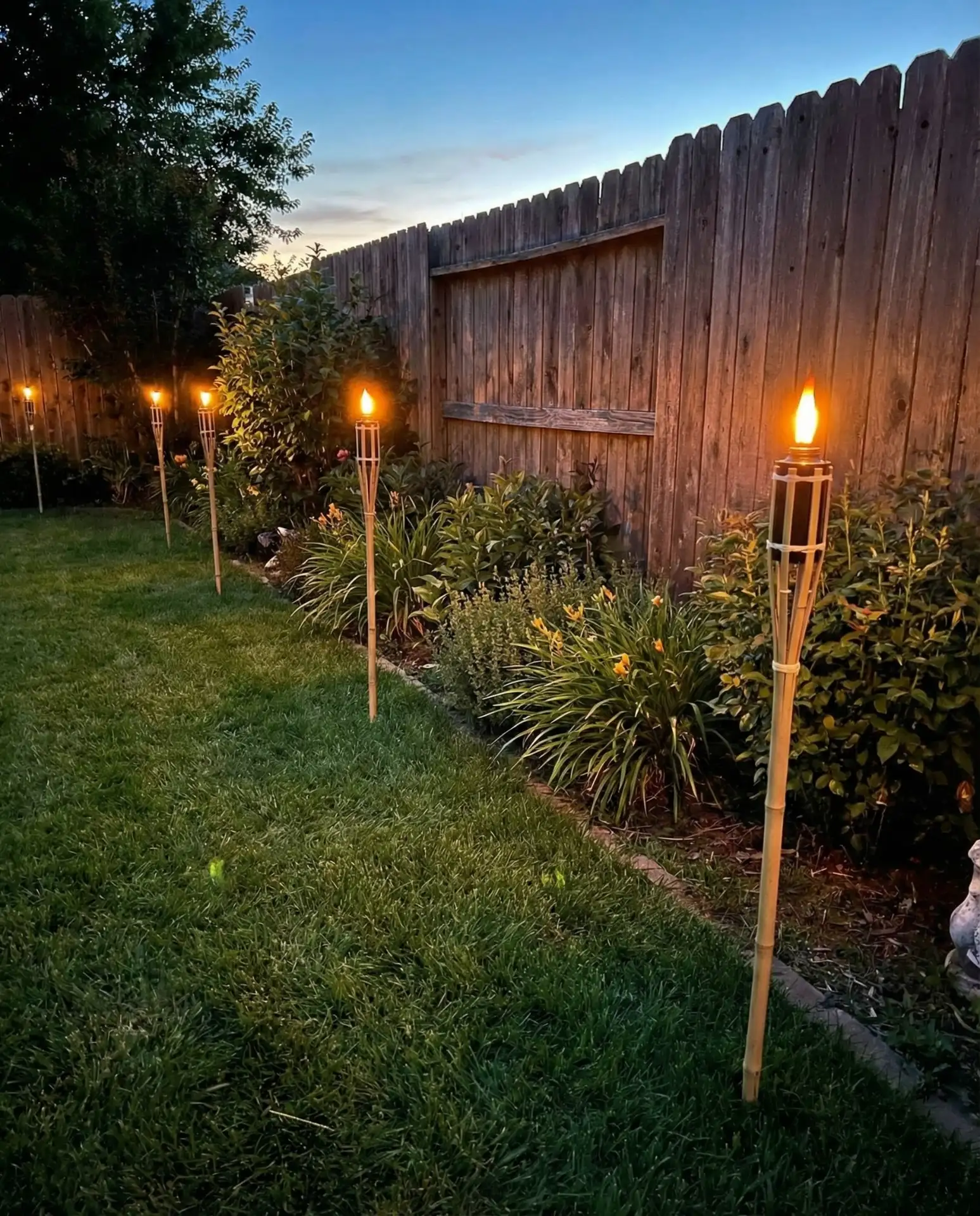 Tiki Torches with LED Inserts for Backyard Perimeters 2