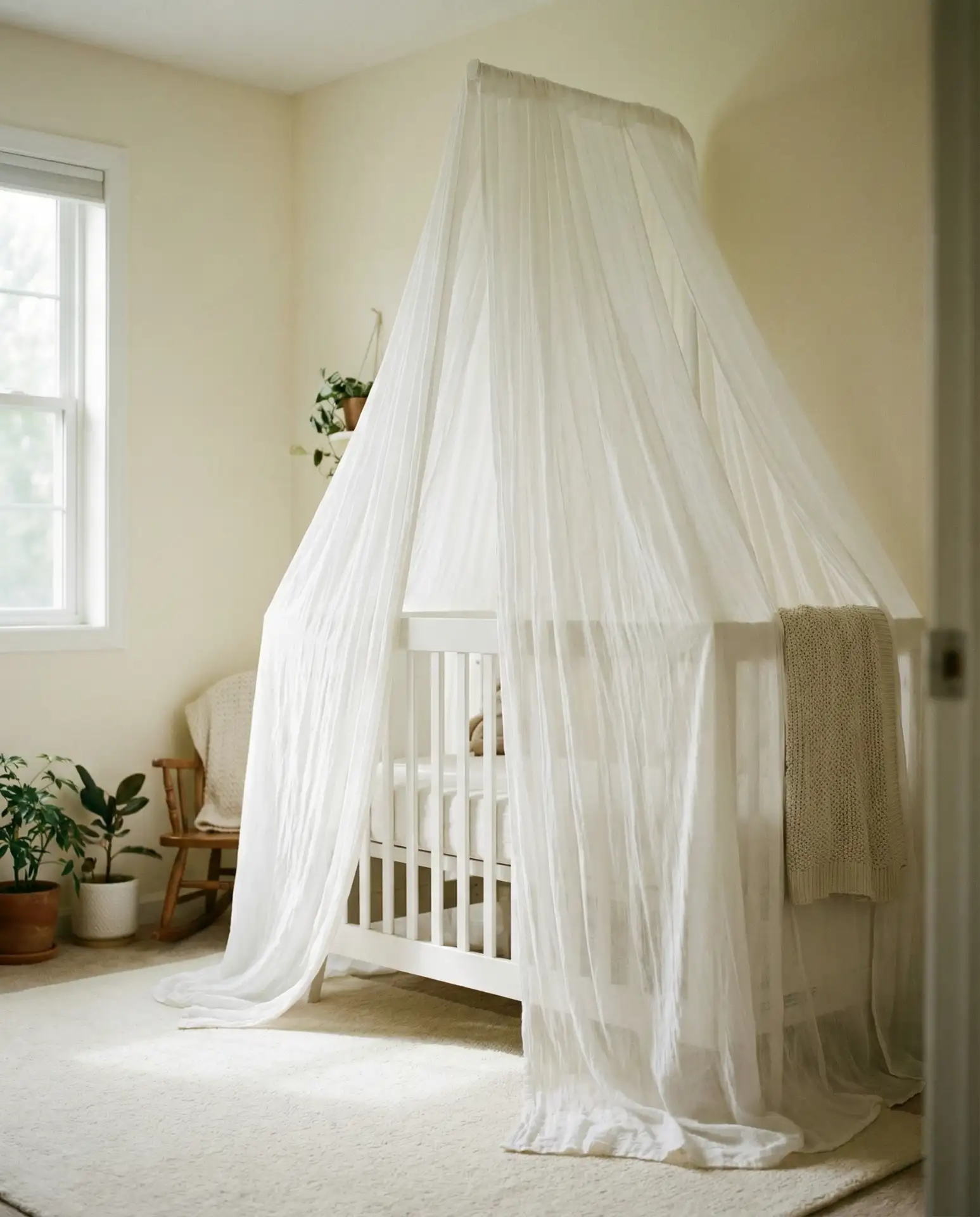 Canopy Crib with Flowing Sheer Drapes 1