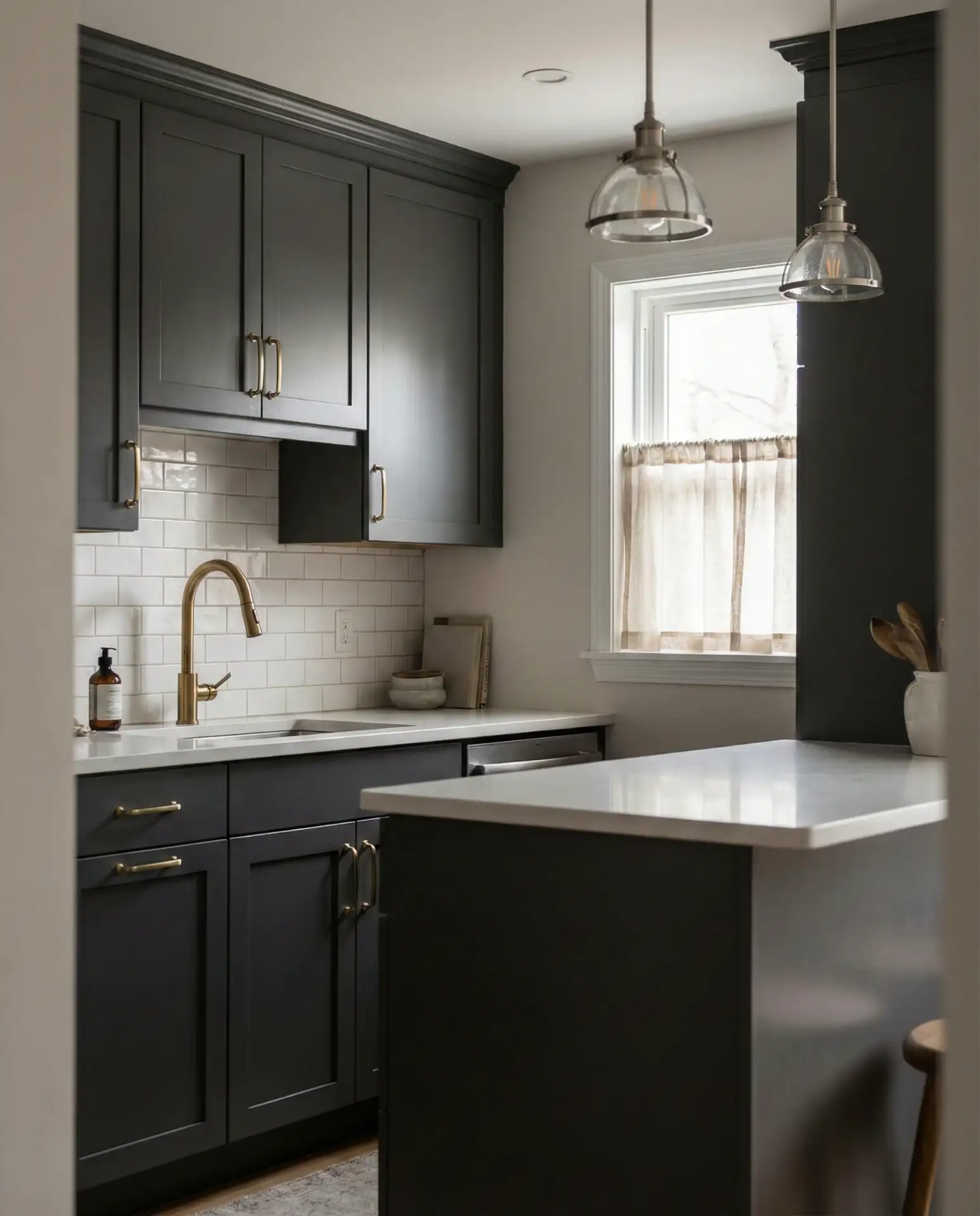 Charcoal Cabinets with Warm Brass Accents 1