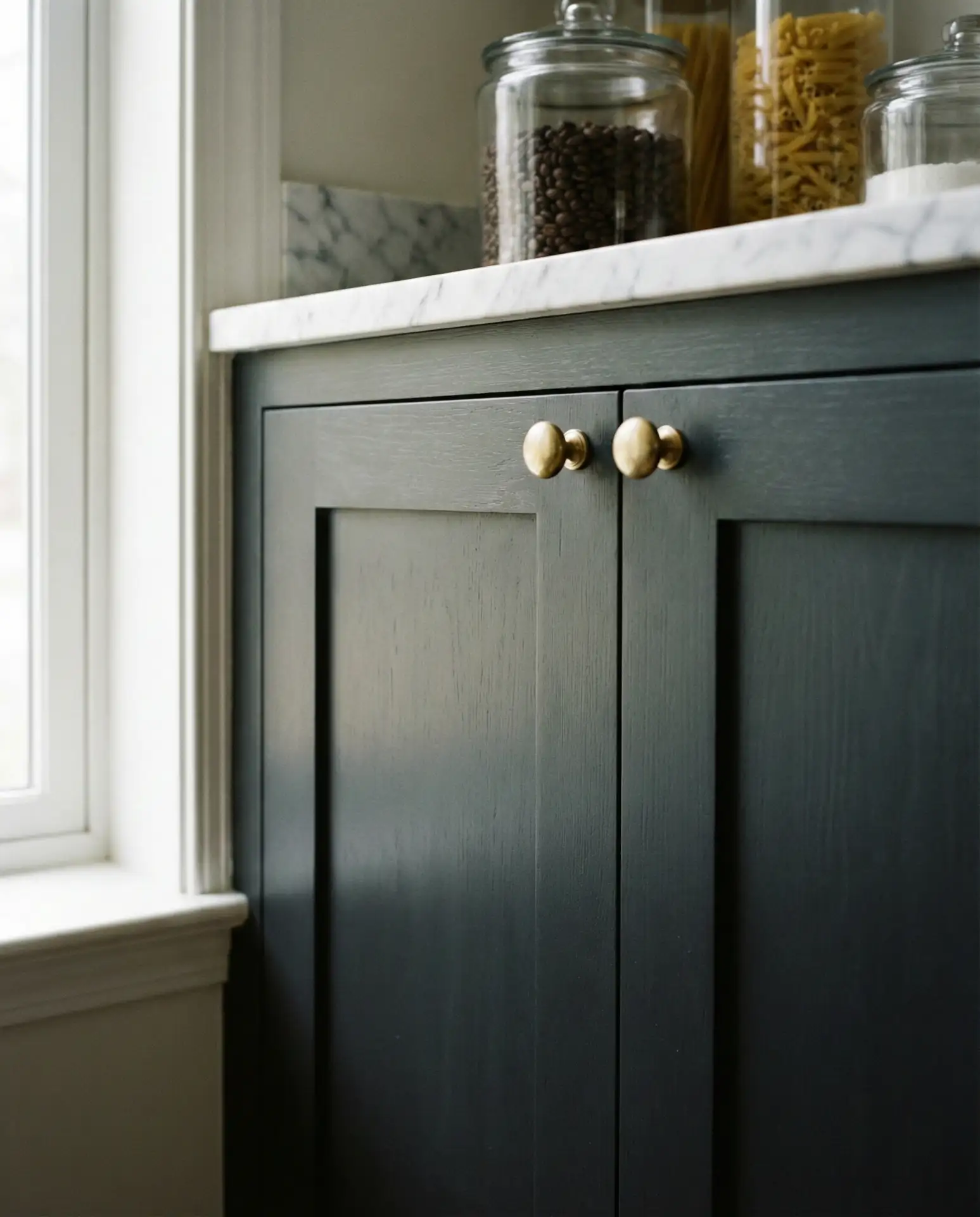 Charcoal Cabinets with Warm Brass Accents 2