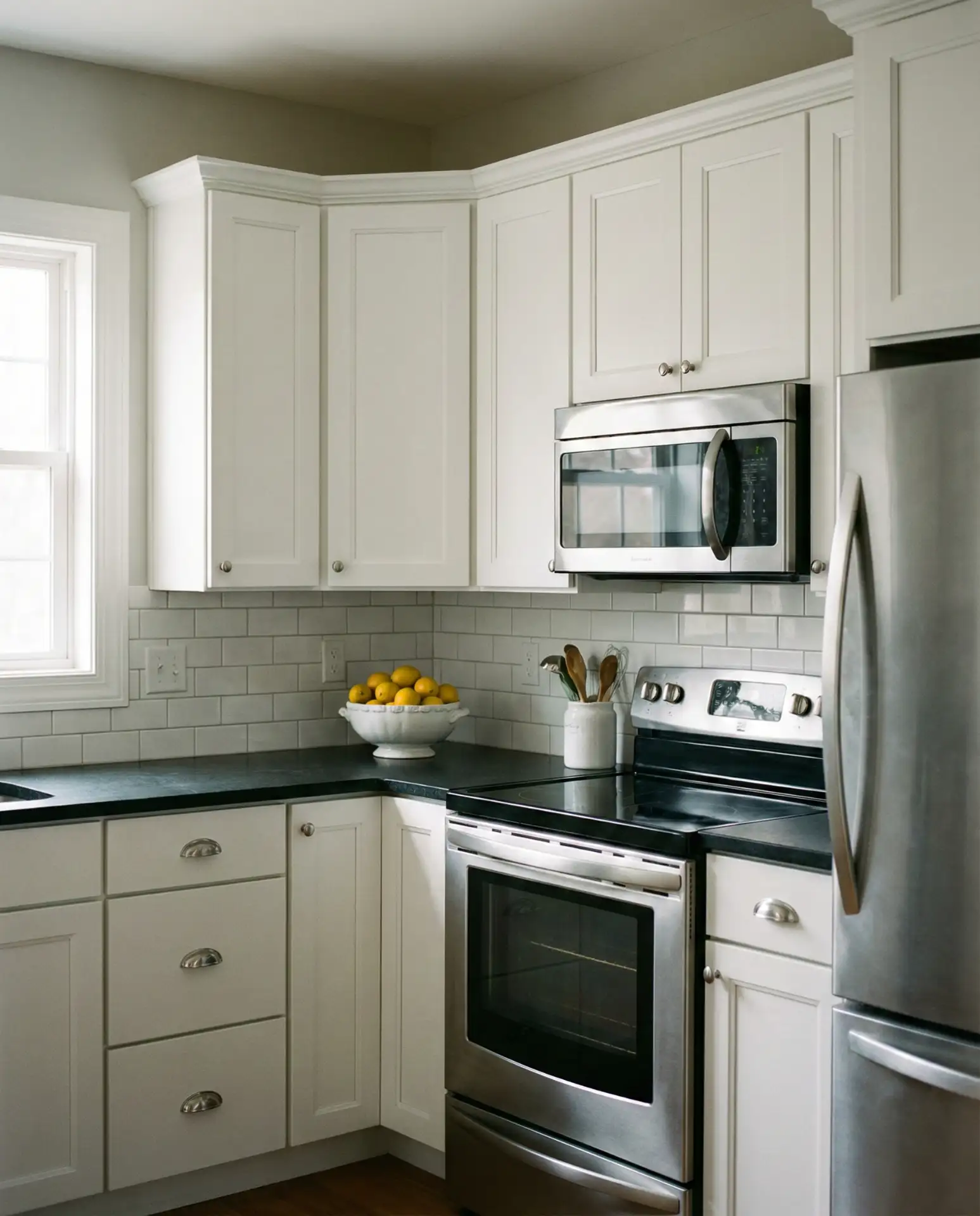 Classic White Cabinets with Black Countertops 1