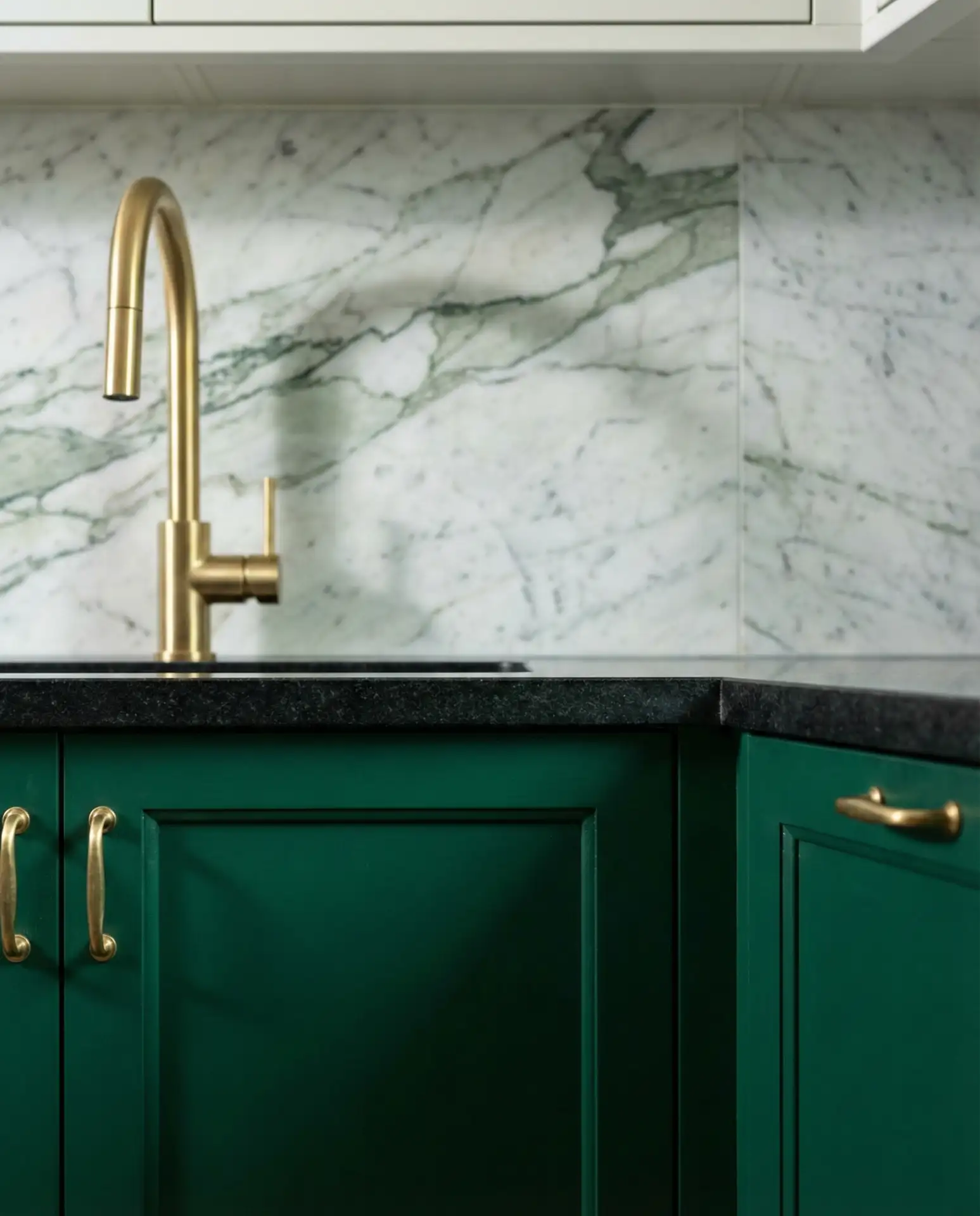 Dark Emerald Cabinets with Black Countertops 2
