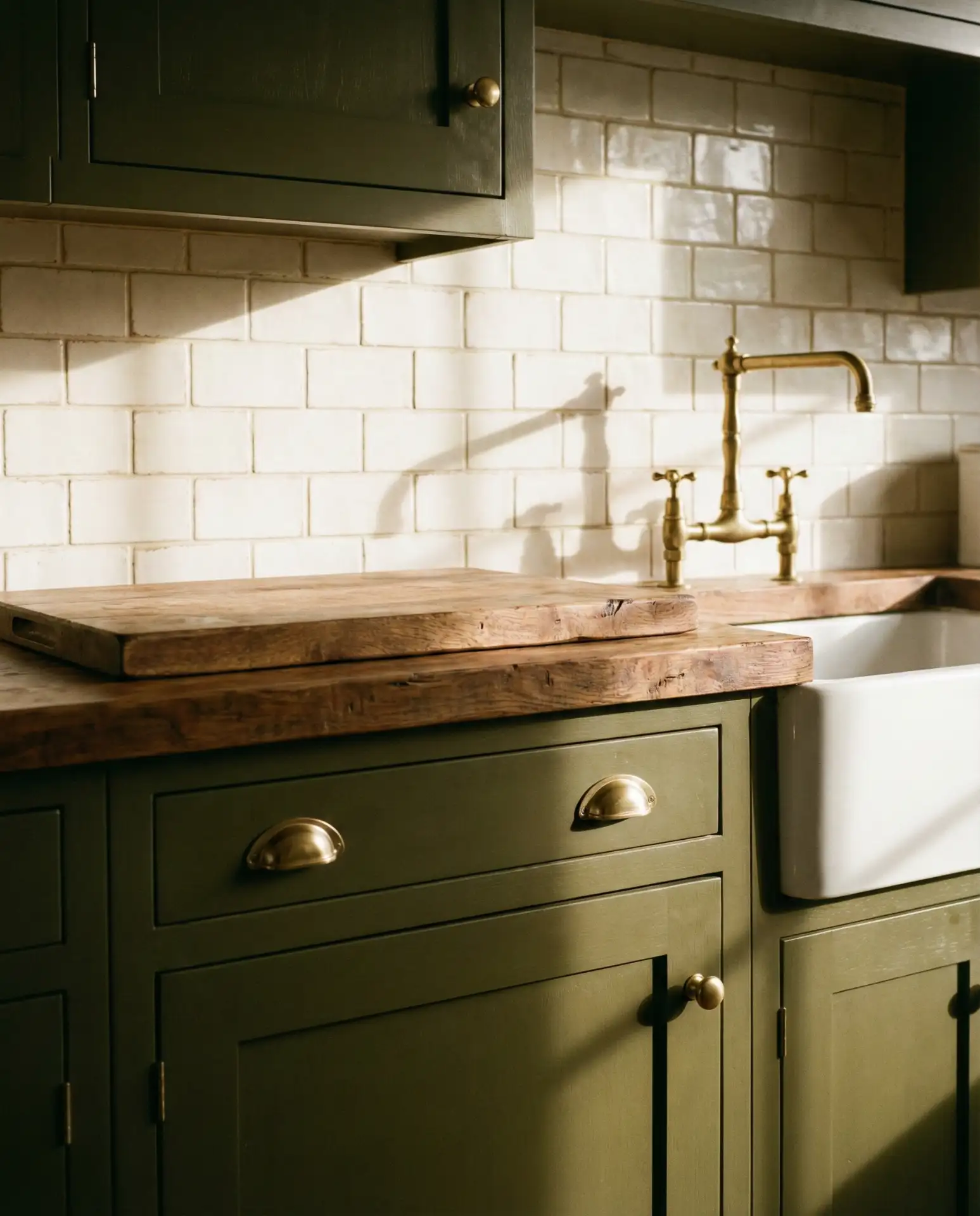 Green Cabinetry with Brass Accents 2