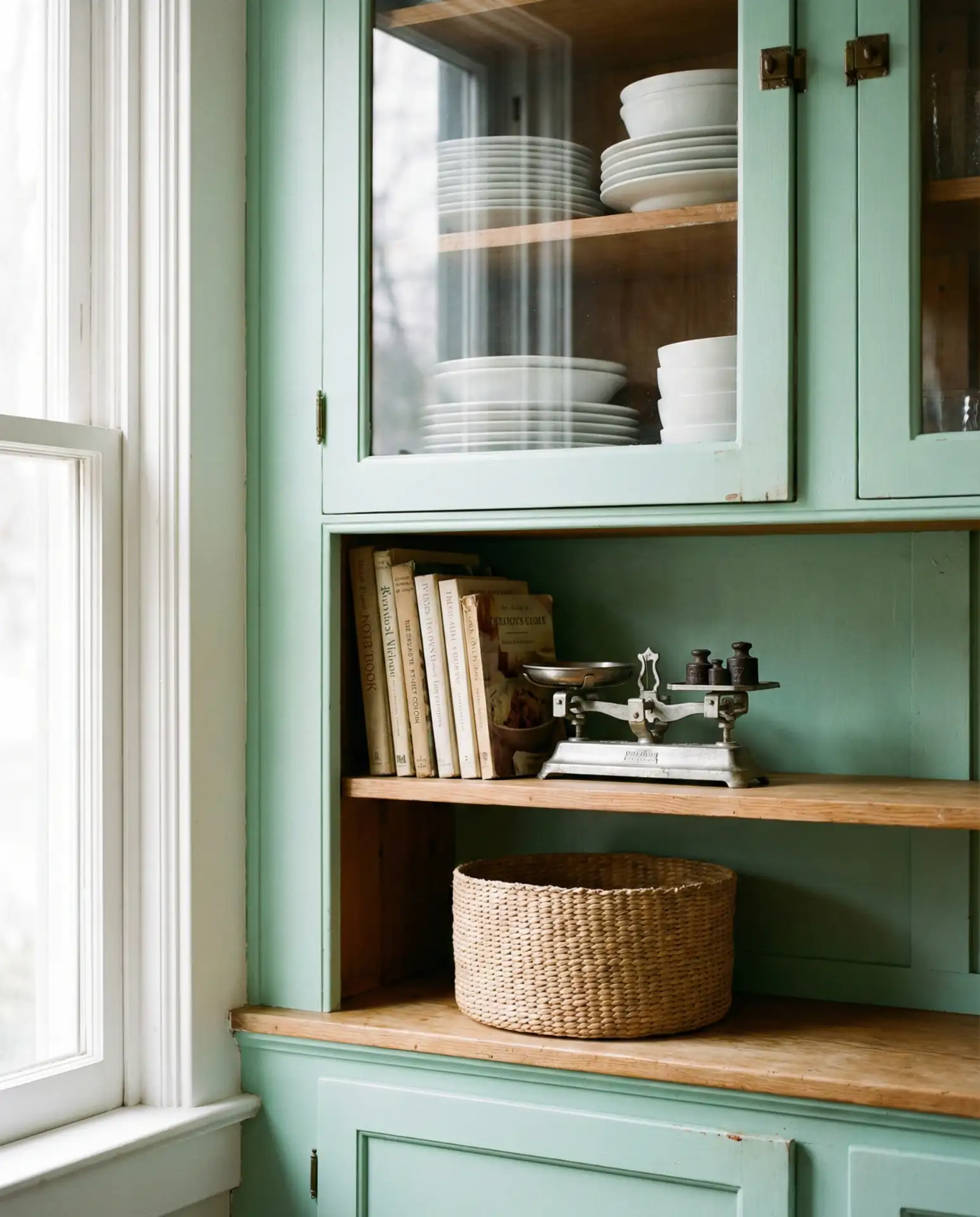 Pale Mint Cabinets in a Tiny Cottage Kitchen 1