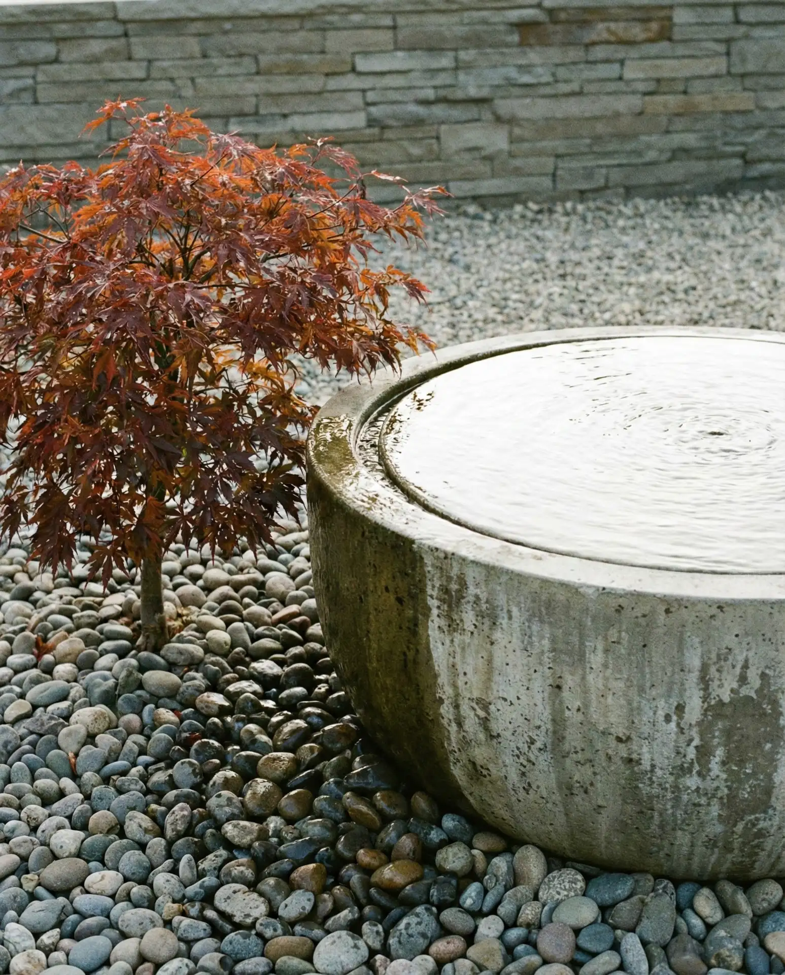 Round Concrete Fountain for Minimalist Gardens 2