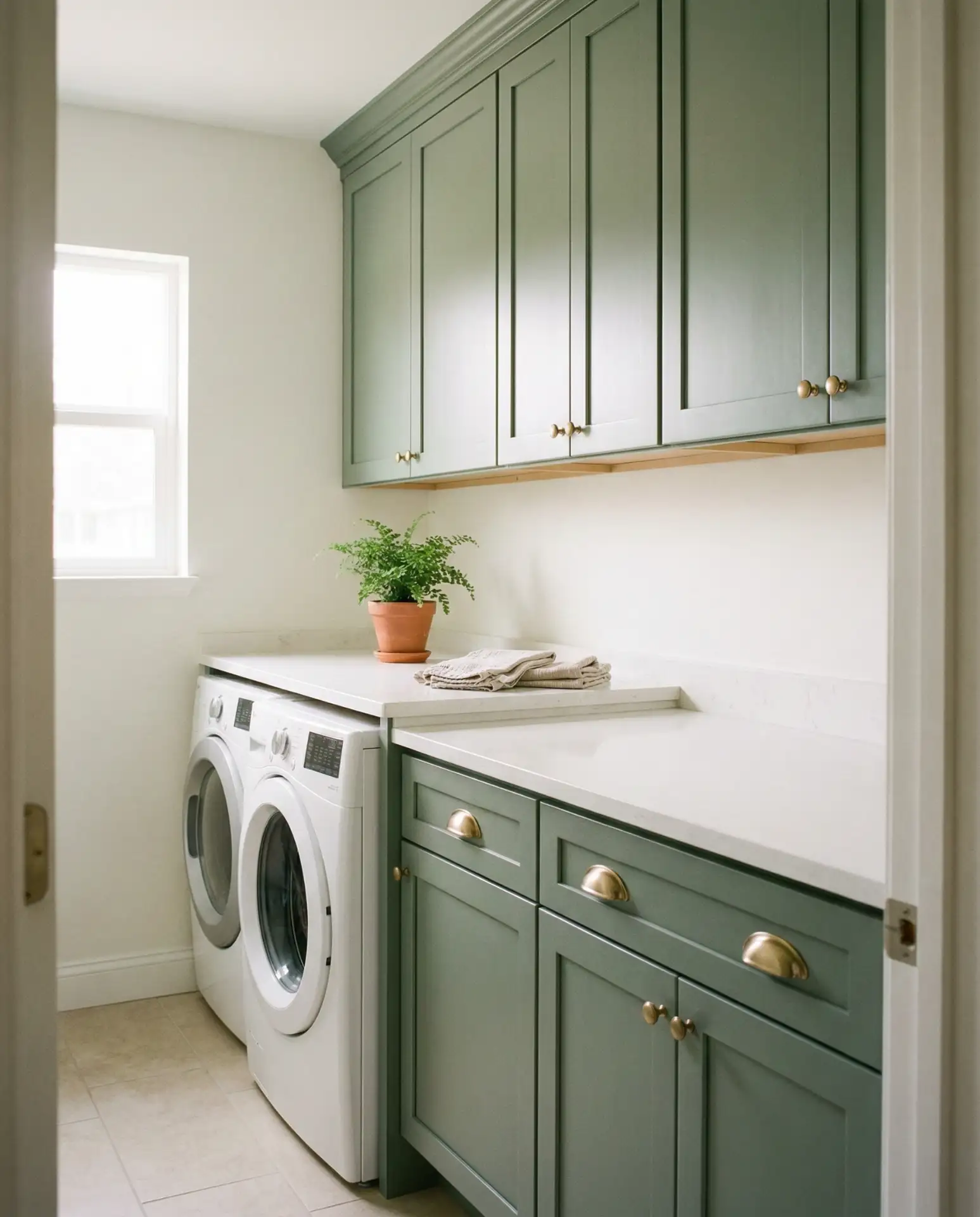 Sage Green Cabinets with Brass Hardware 1