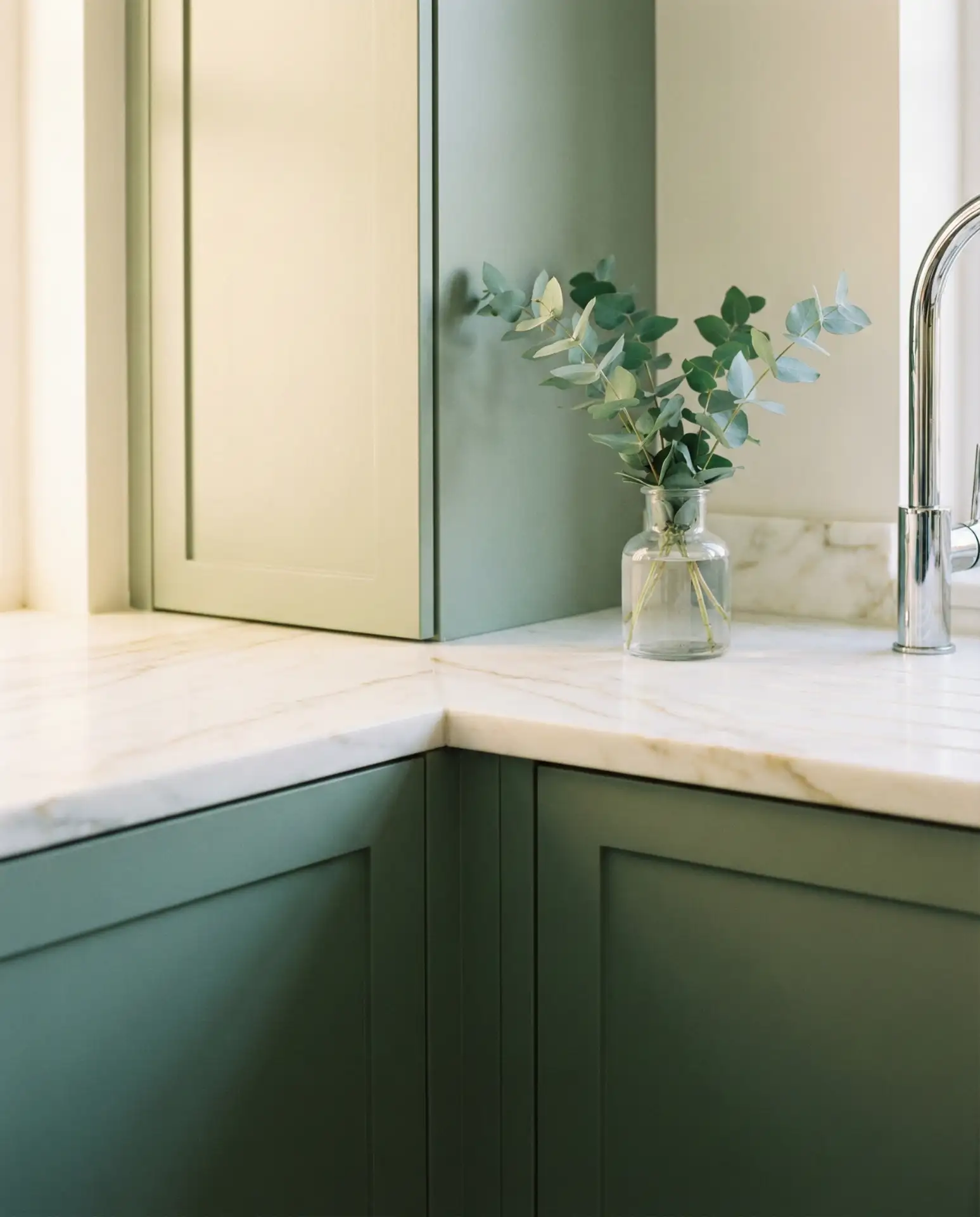 Sage Green Cabinets with Marble Countertops 1