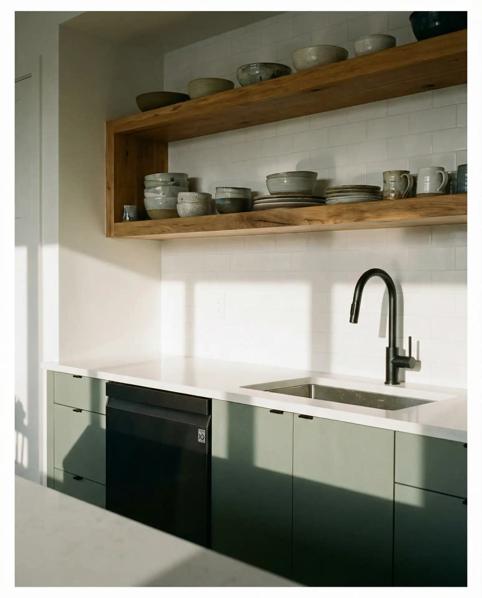 Sage Green Kitchen with Black Appliances 2