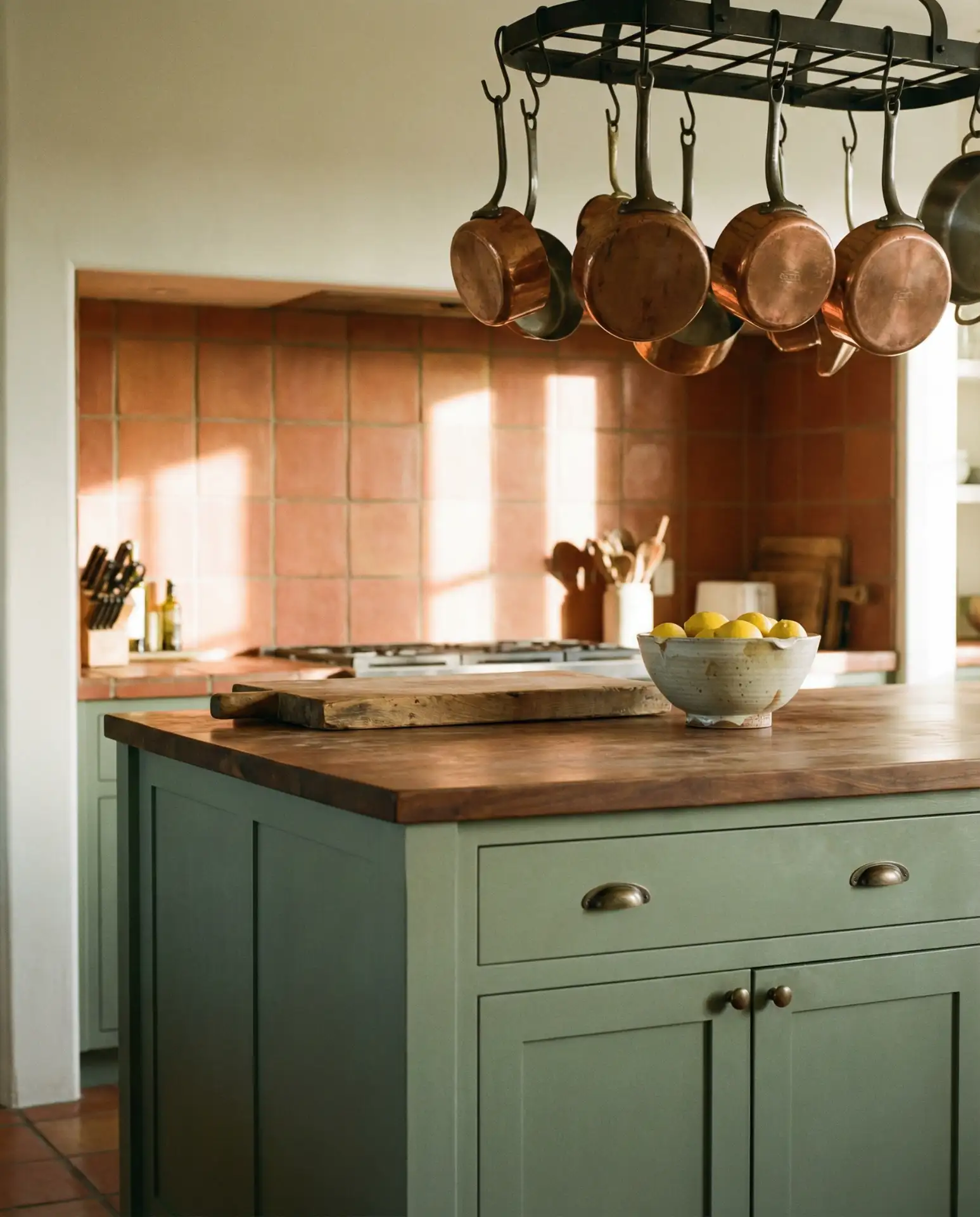 Sage Green Kitchen with Terracotta Accents 1