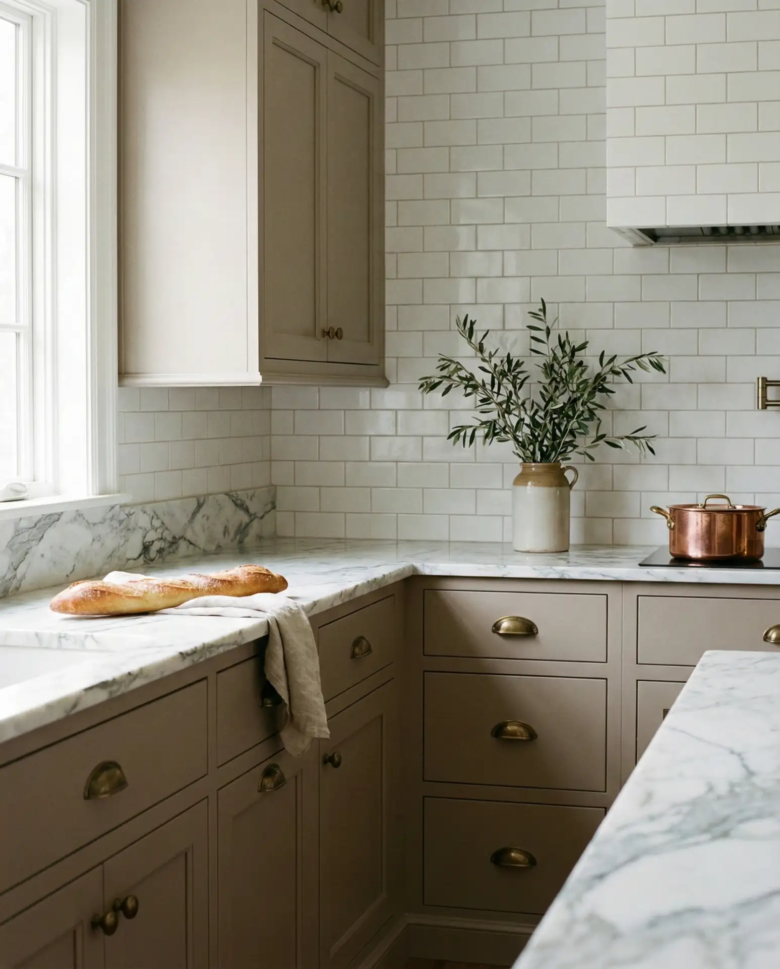 Taupe Cabinets with Marble Countertops 1