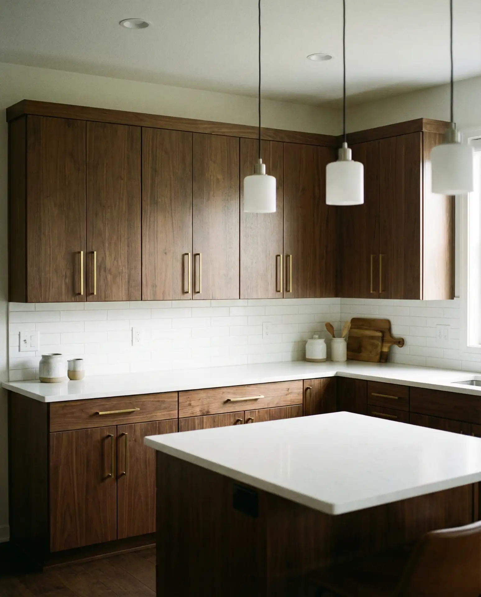 Warm Walnut Cabinetry with Brass Hardware 1