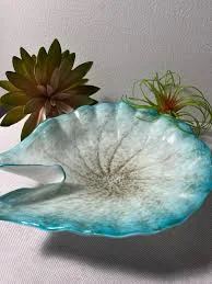 Turquoise shell shaped hand blown art glass bowl with gold flecks