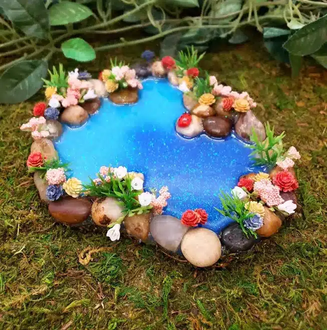 Fairy Garden Pond with Flowers and Fairy Plants Surrounding the Entire Pond, Min