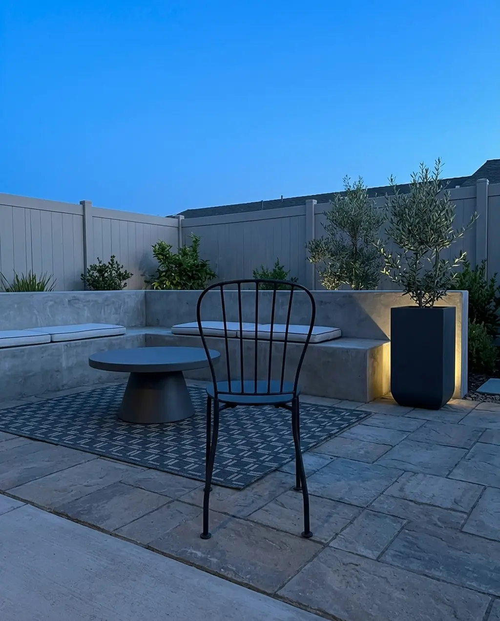 Modern Patio with Built-in Concrete Seating
