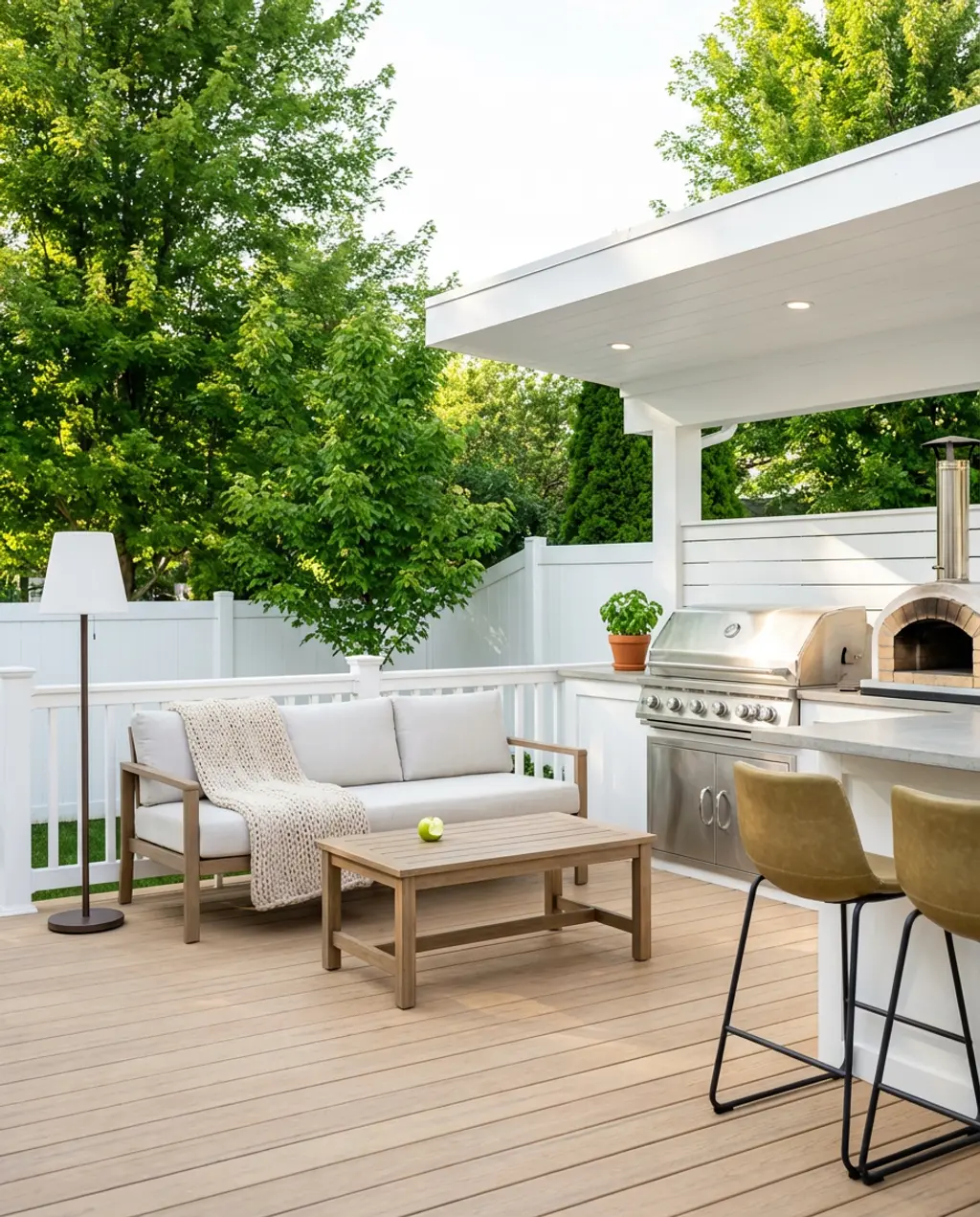 Covered Outdoor Kitchen with Pizza Oven & Bar Seating