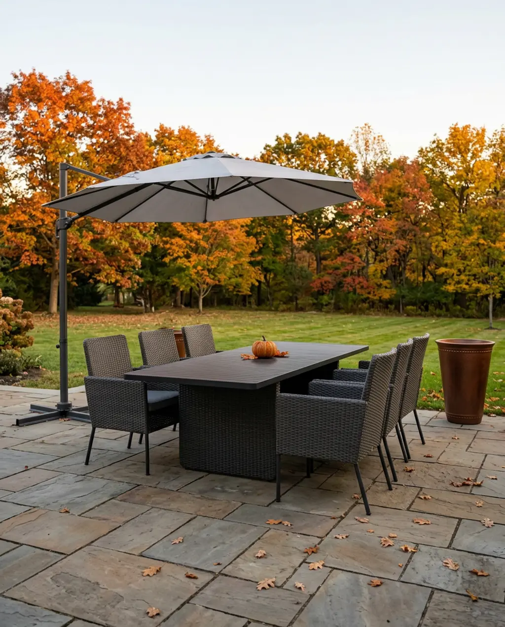 Contemporary Gray Woven Dining Set with Large Cantilever Umbrella