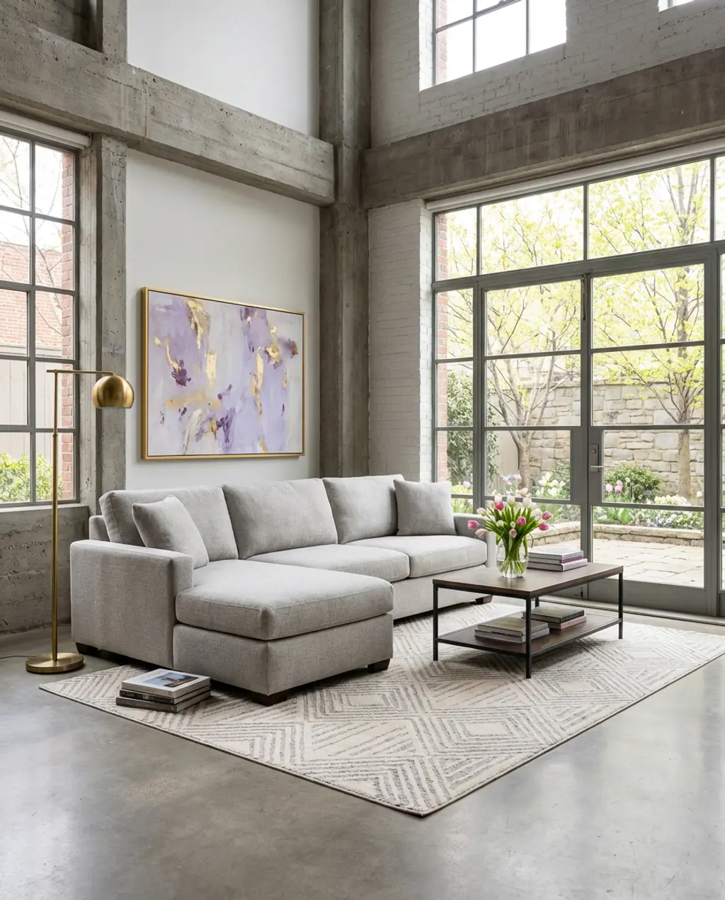 Loft Apartment Living Room with Double Height Ceilings and Large Artwork