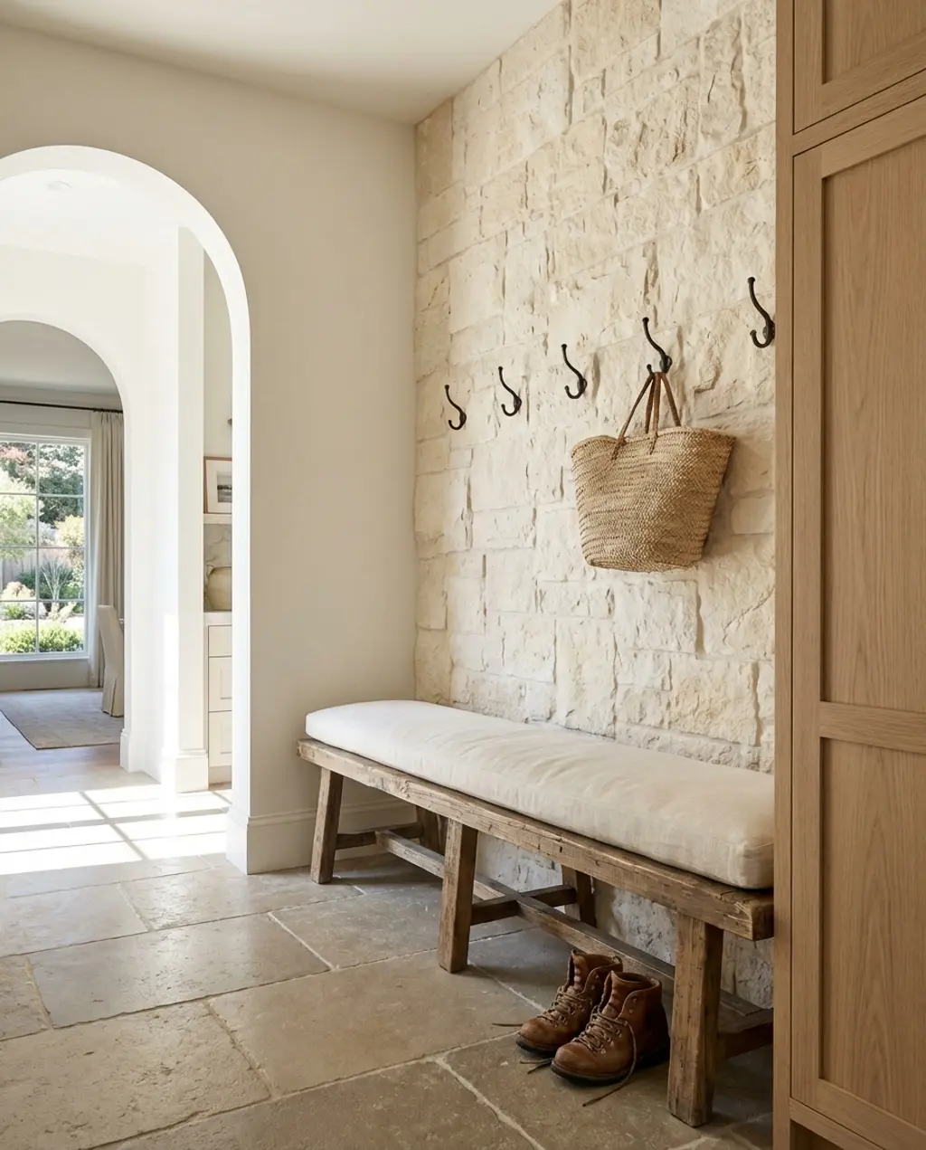 Rustic Luxe Mudroom with Stone Accent Wall