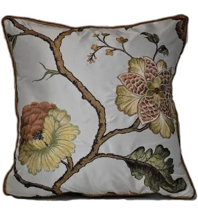 gold embroidered floral decorative throw pillow on white silk like taffetta