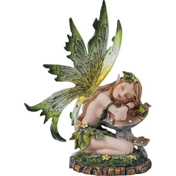 Green Fairy Sleeping On Mushroom Statue