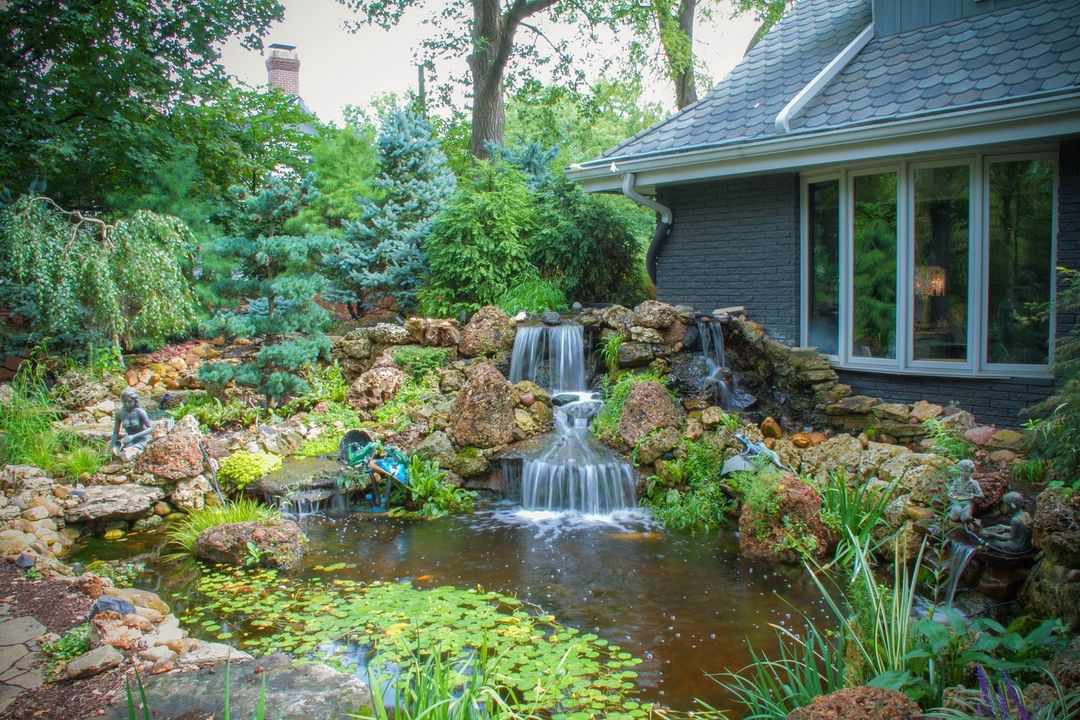 25 Small Ponds With Waterfalls Worth Adding to Your Yard