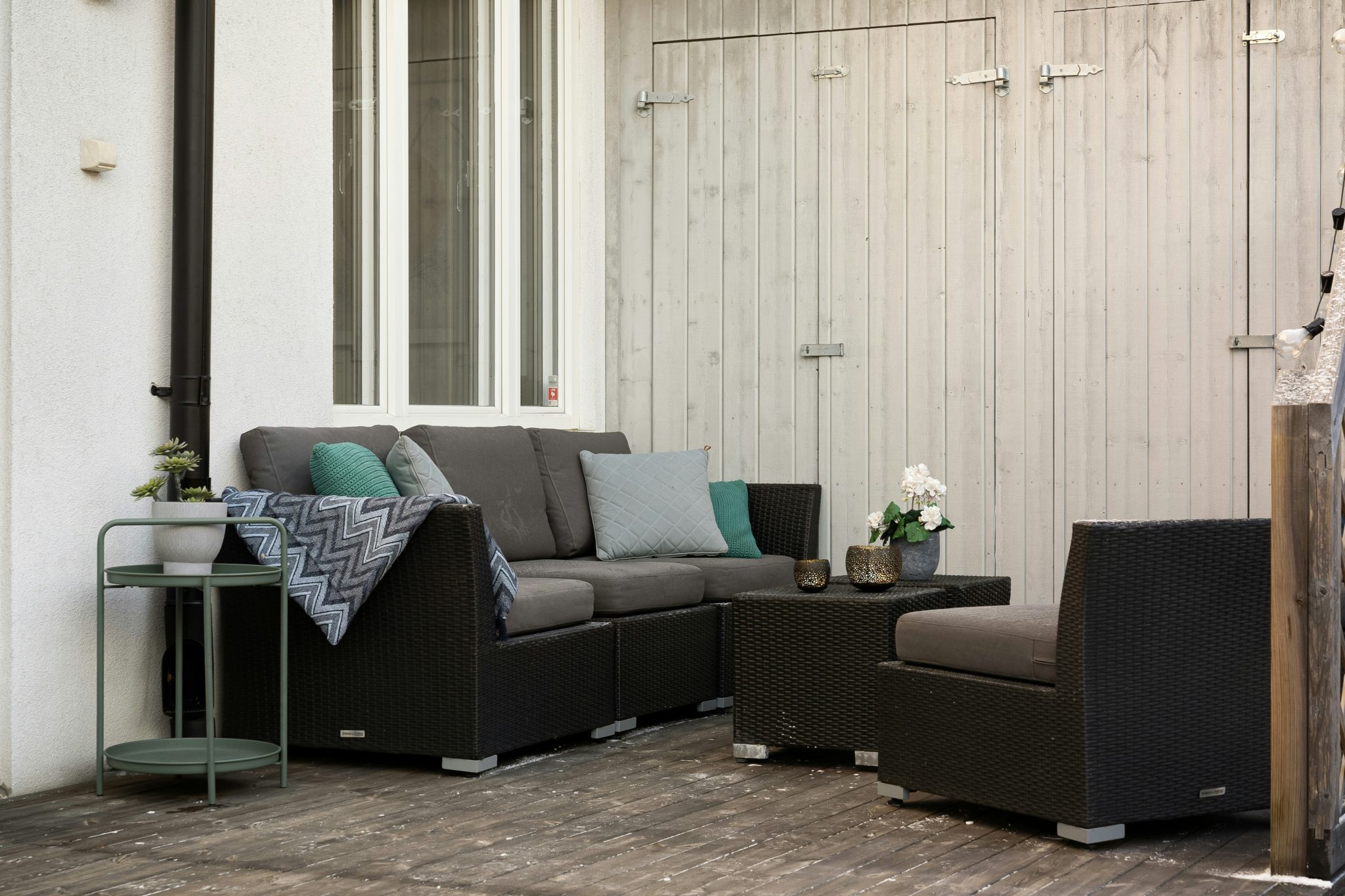 A living room with a couch and a chair