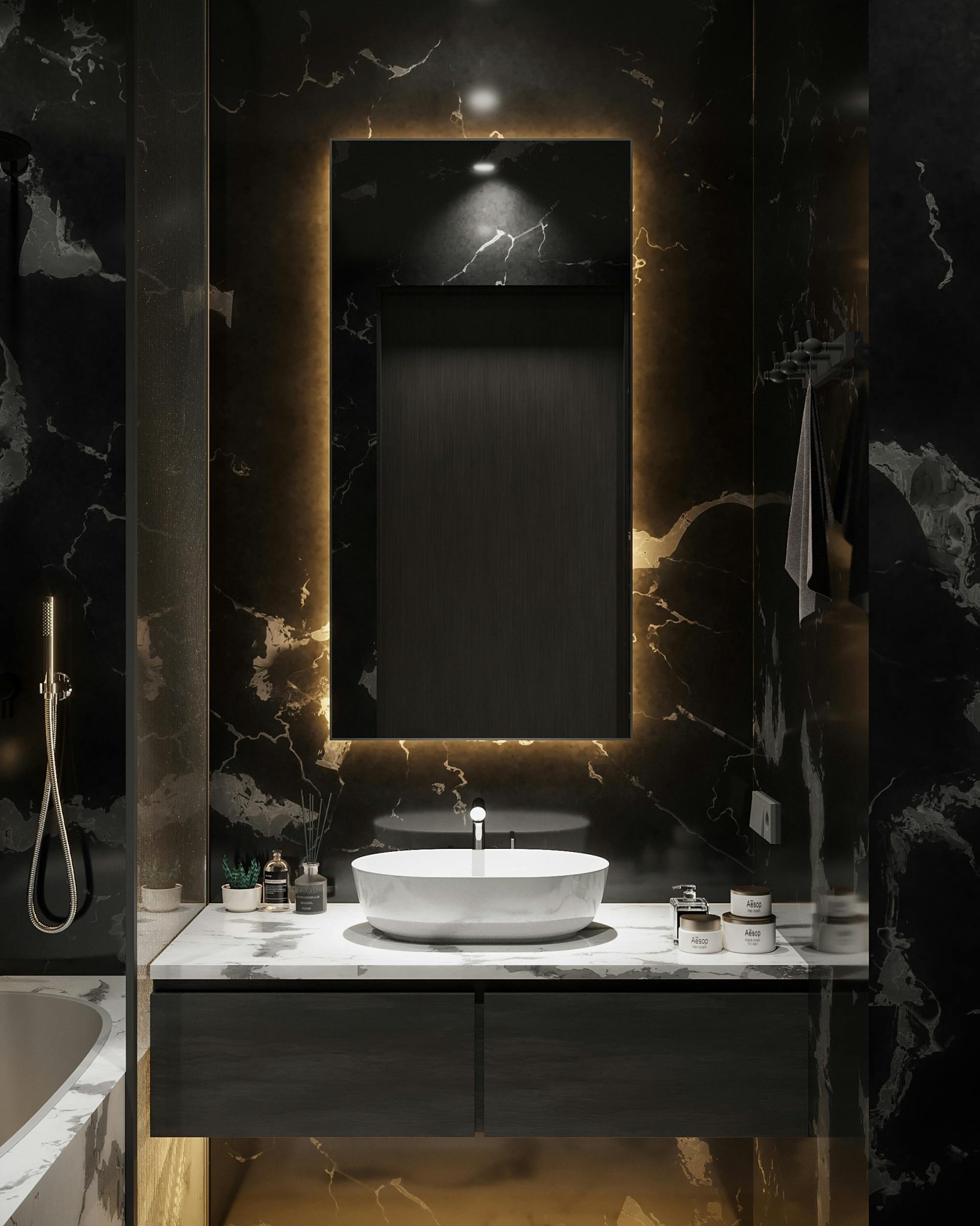 A luxurious bathroom with a marble finish and elegant lighting.