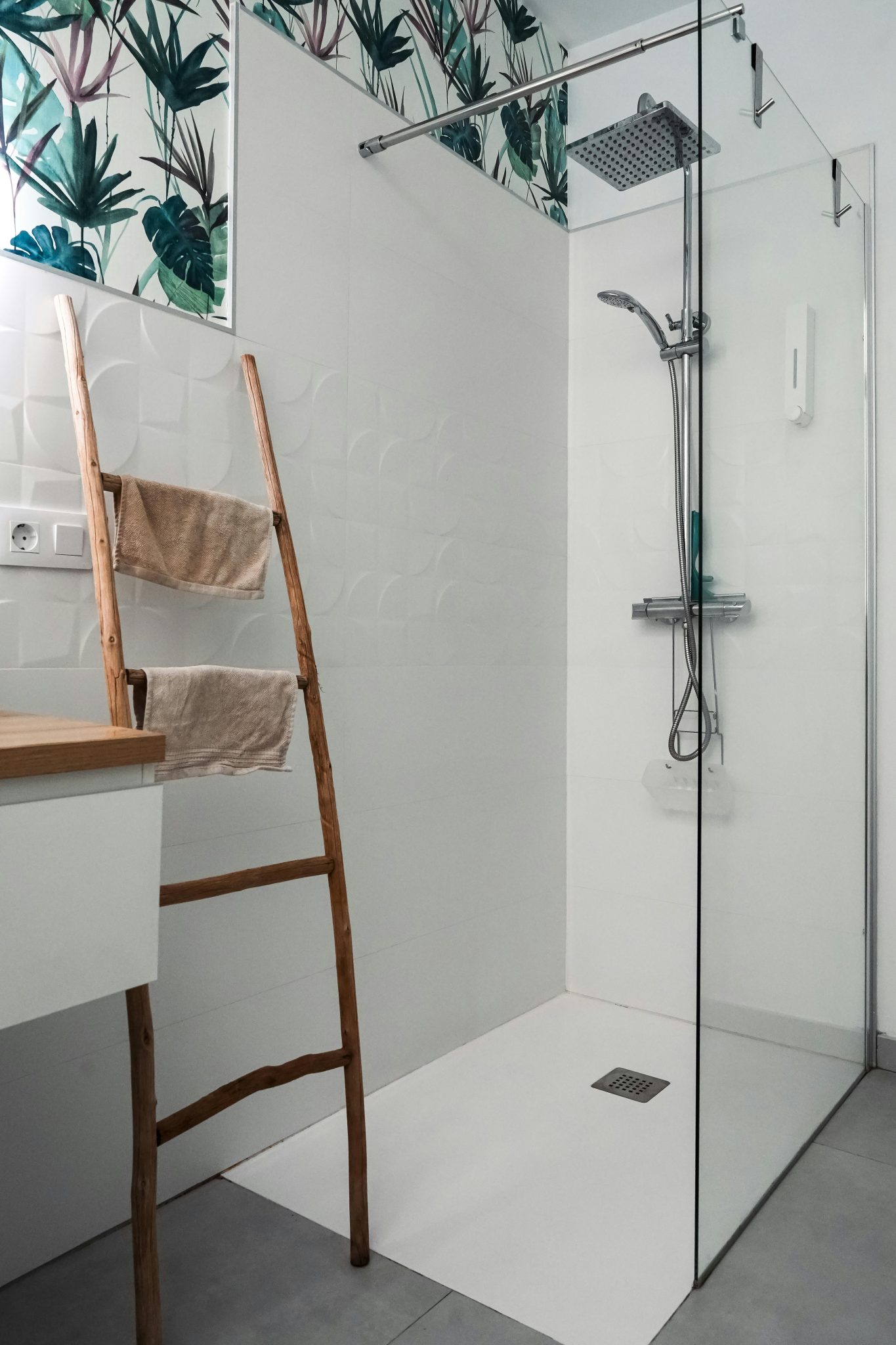 A sleek and modern bathroom with a tropical theme in Lanzarote, Spain.