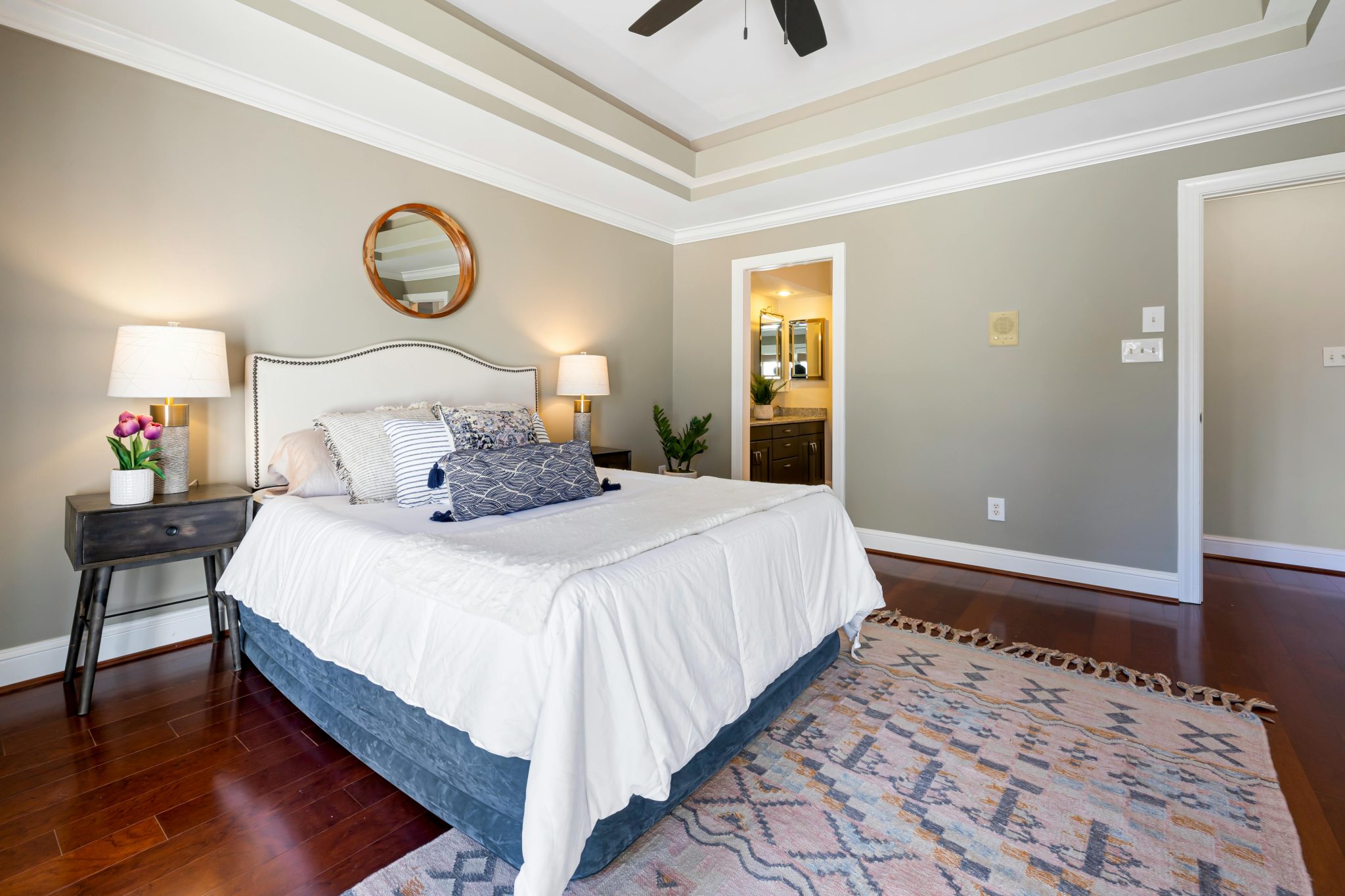 A stylish modern bedroom featuring elegant décor and lighting, perfect for interior design inspiration.