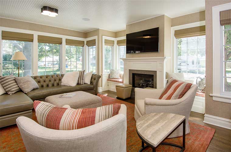 A Stylish Sunroom Addition Creates a Bright and Cozy Retreat - Silent Rivers Design+Build | Custom Homes & Remodeling Des Moines
