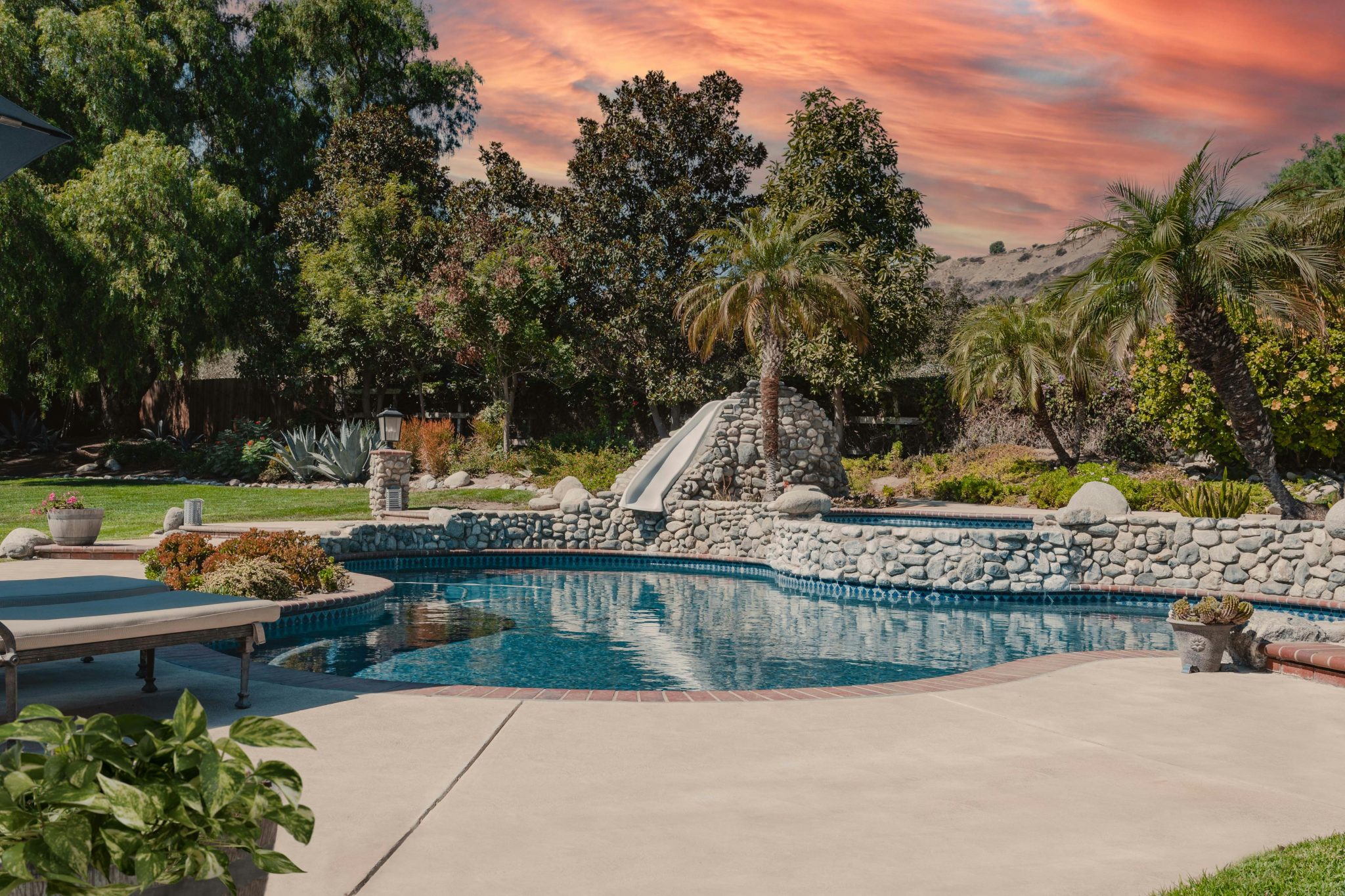  Backyard photo of large California home. 