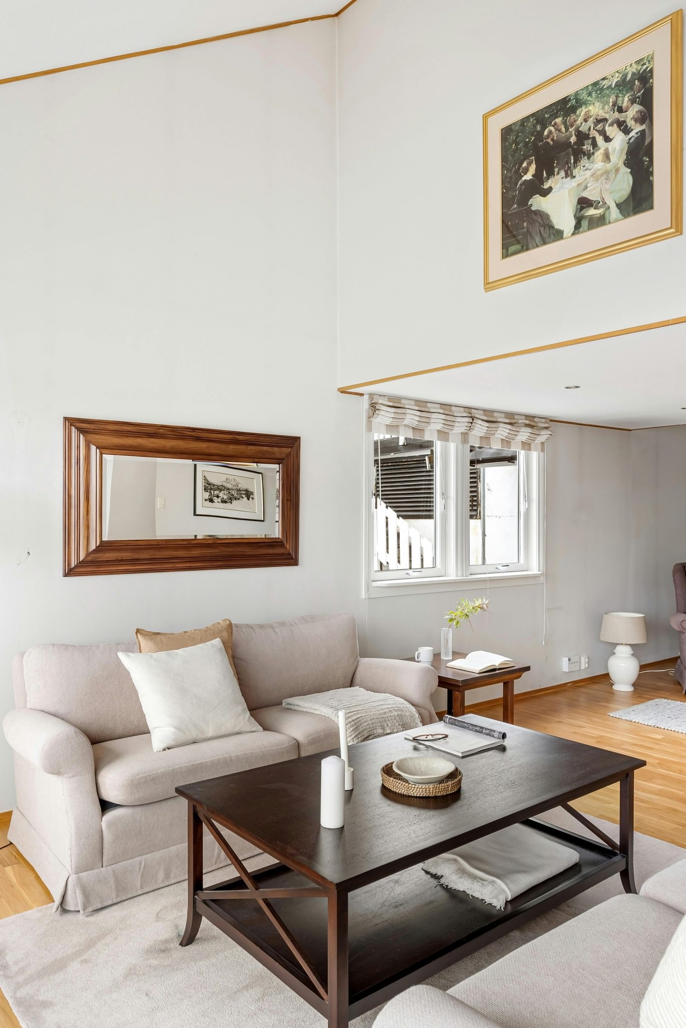 Bright and airy living room with modern furniture and neutral tones.