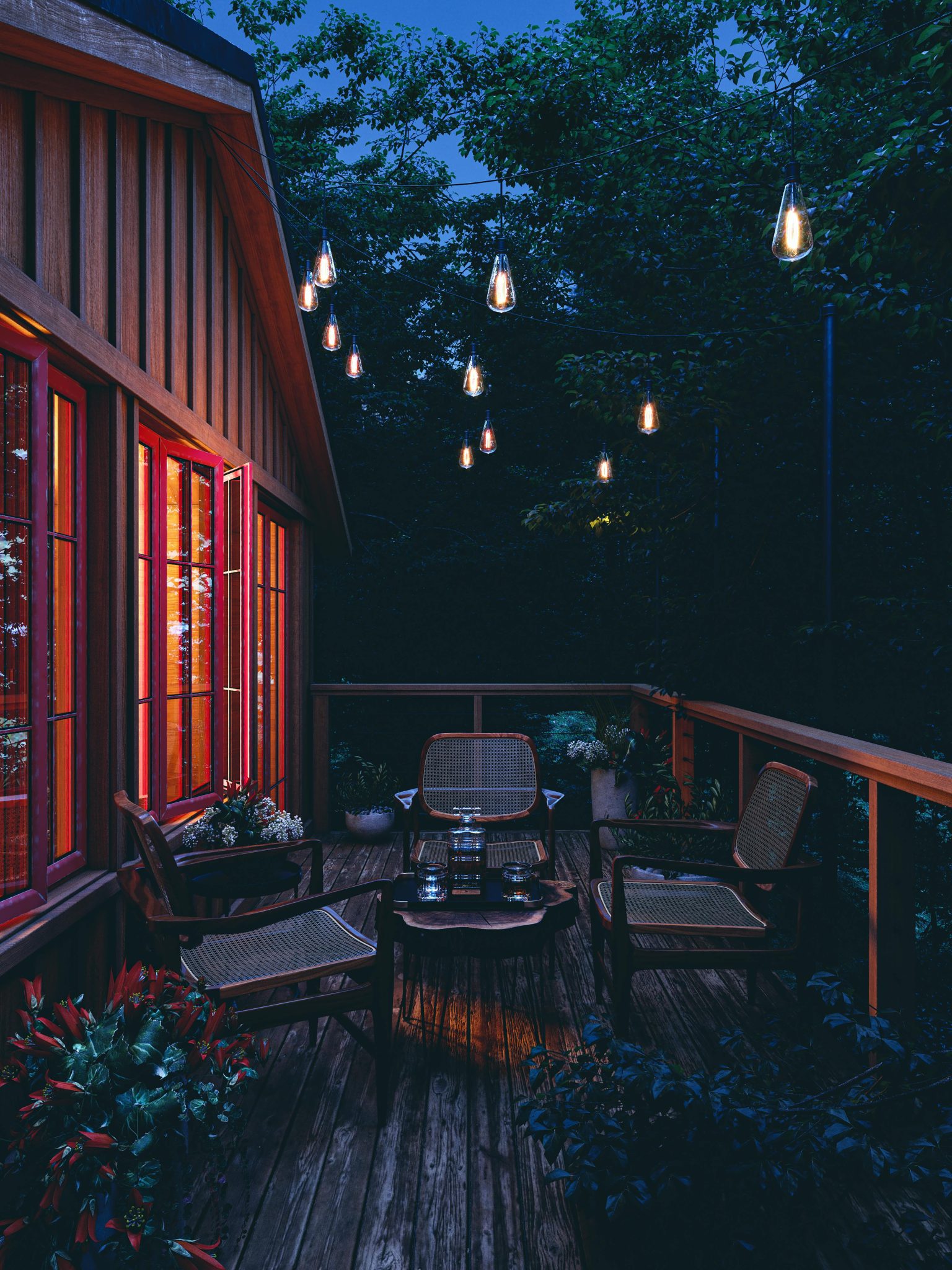 Charming outdoor seating area with string lights illuminating a wooden deck at twilight.
