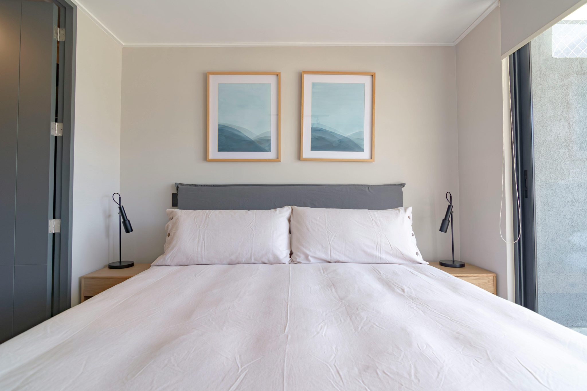 Contemporary bedroom with neutral tones and modern decor elements, perfect for inspiration.