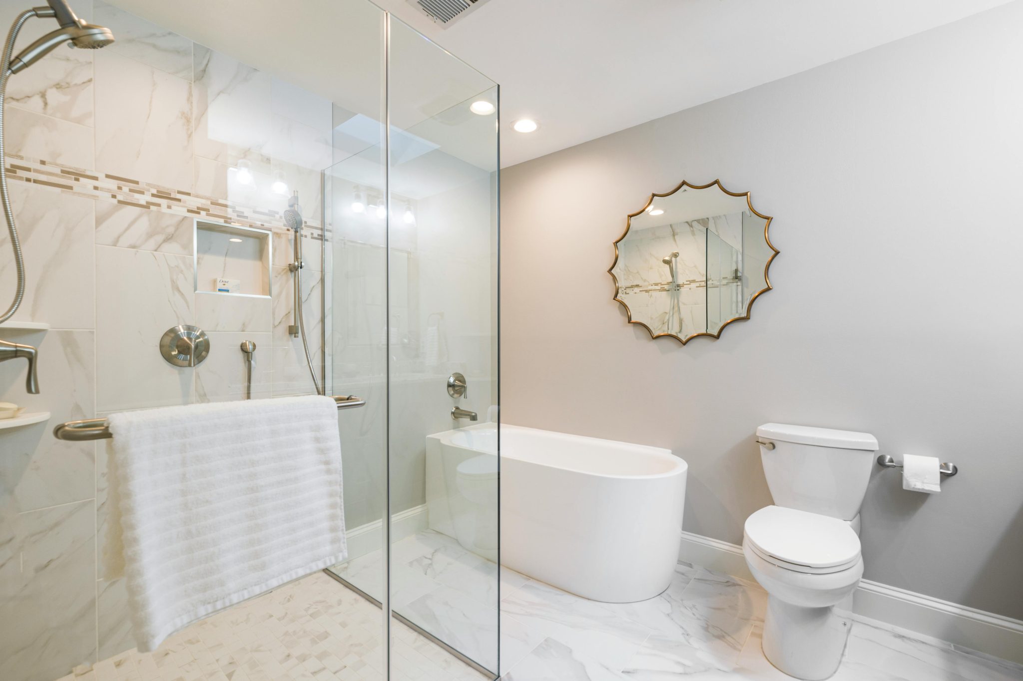 Elegant modern bathroom with glass shower and freestanding tub, perfect for home decor inspiration.