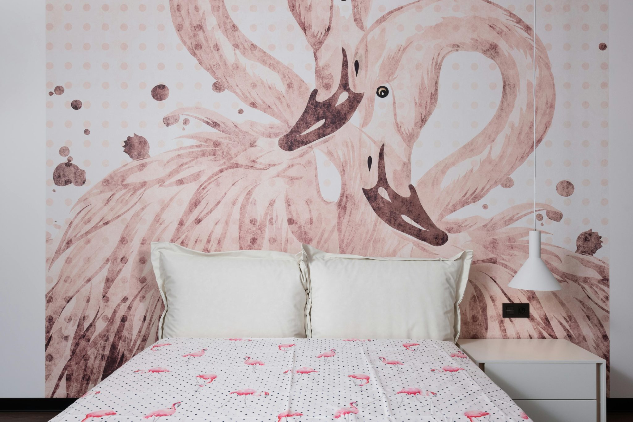 Interior of comfortable bedroom with painted walls near soft bed and bedside table