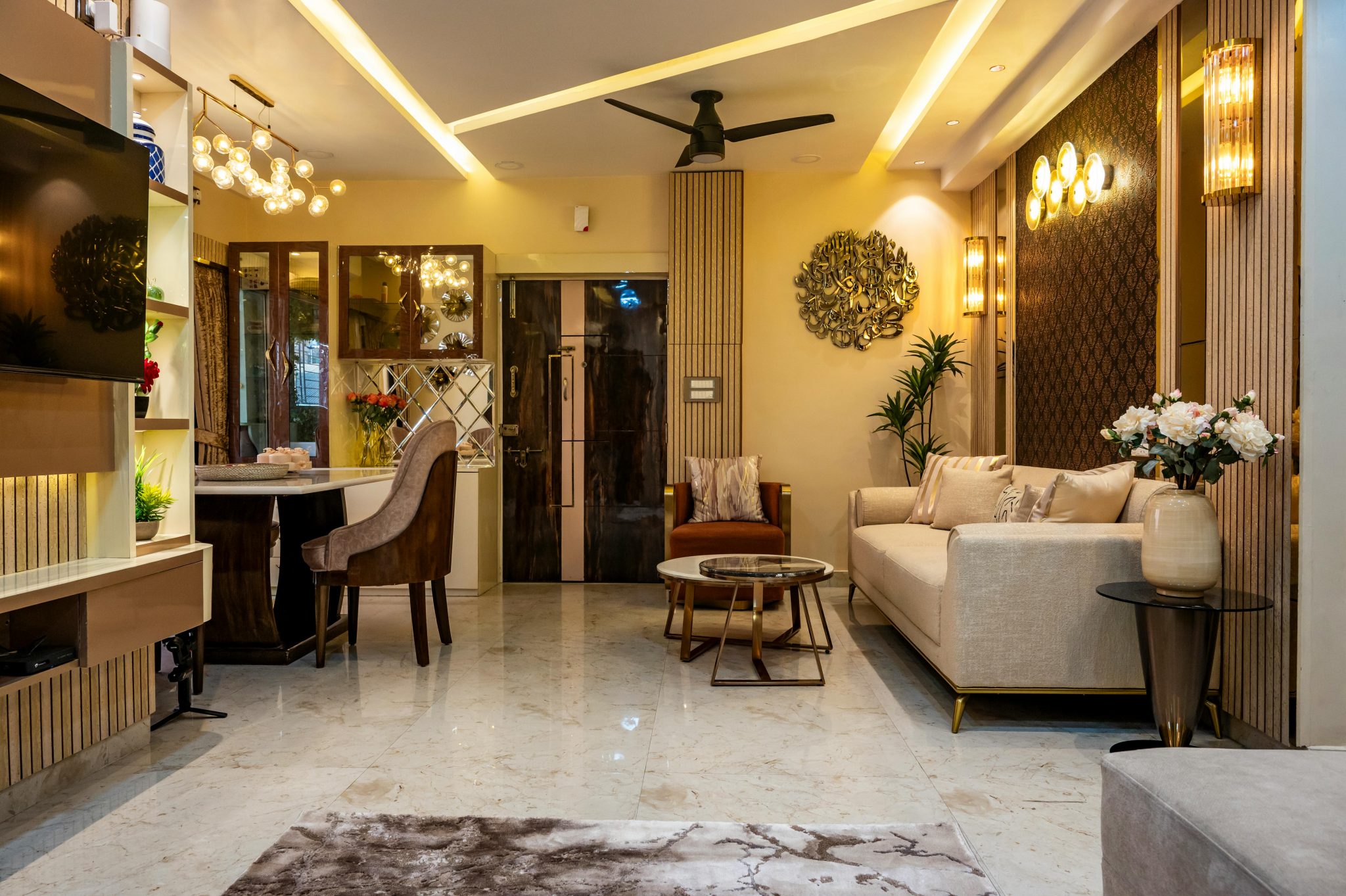 Sleek modern living room with stylish decor, elegant lighting, and cozy seating.