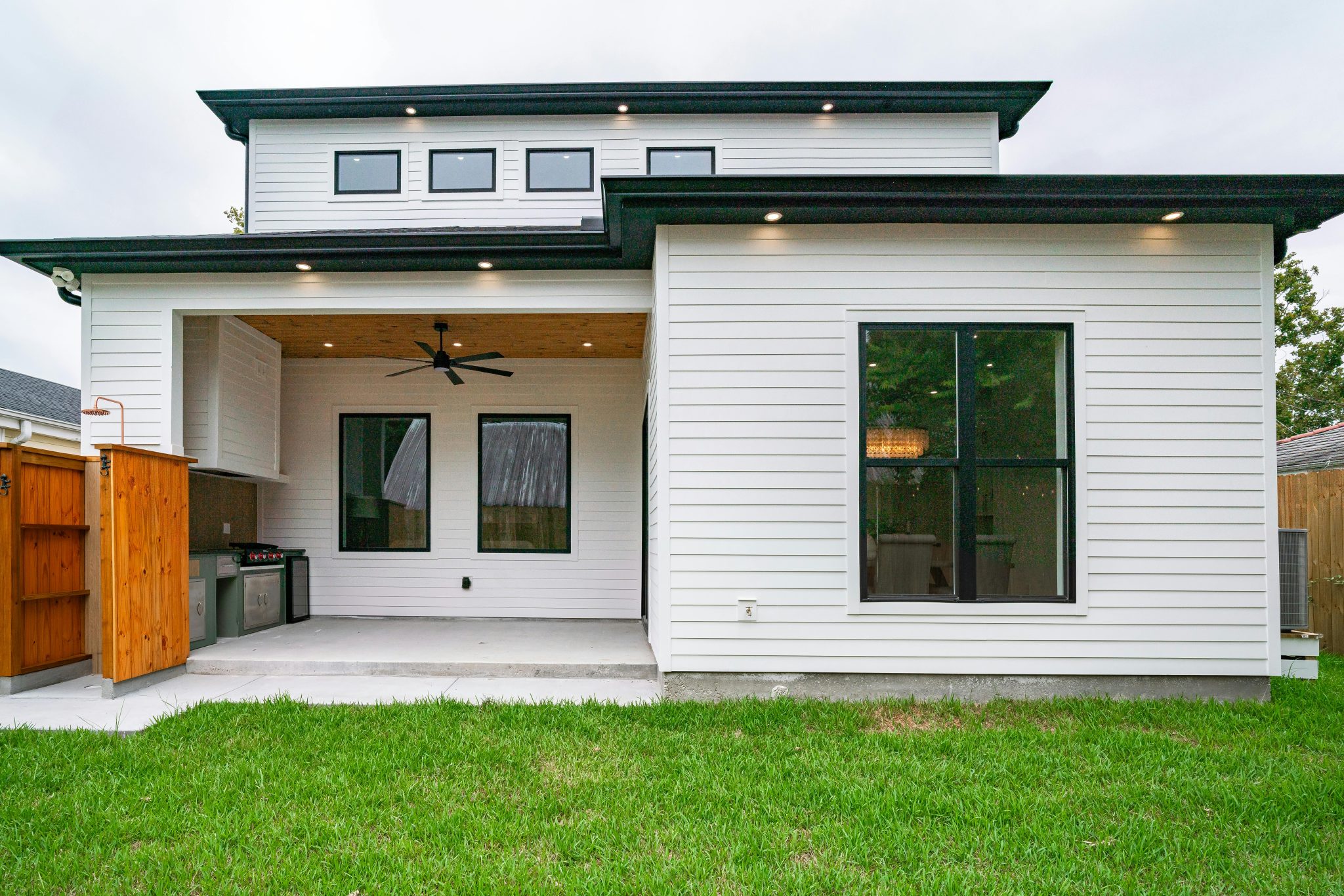 Sleek modern patio view of a New Orleans home showcasing contemporary design.
