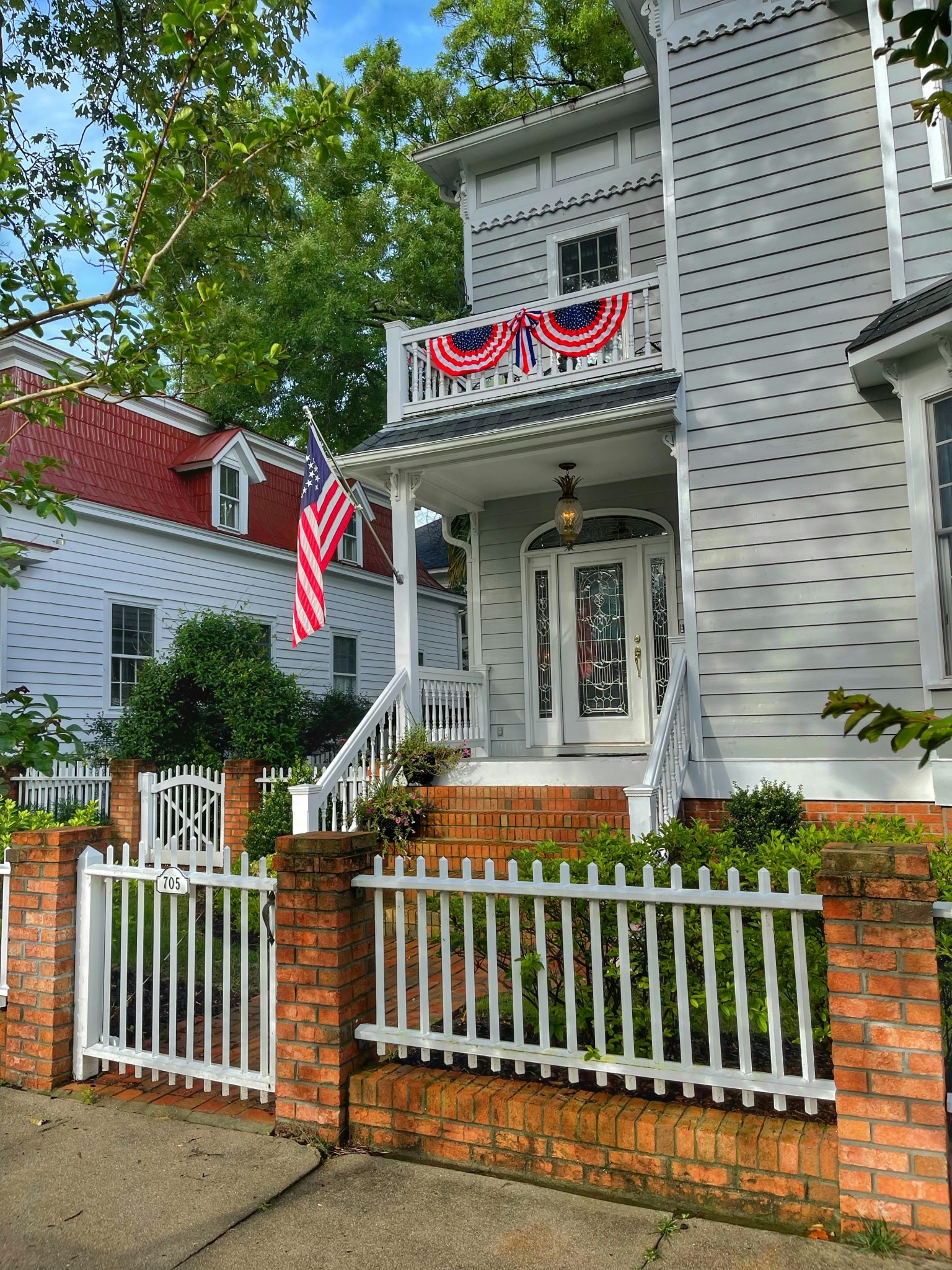 Southern home decorated with a Betsy Ross American flag ready for celebrating America's Independence Day on the 4th of July in New Bern, North Carolina.