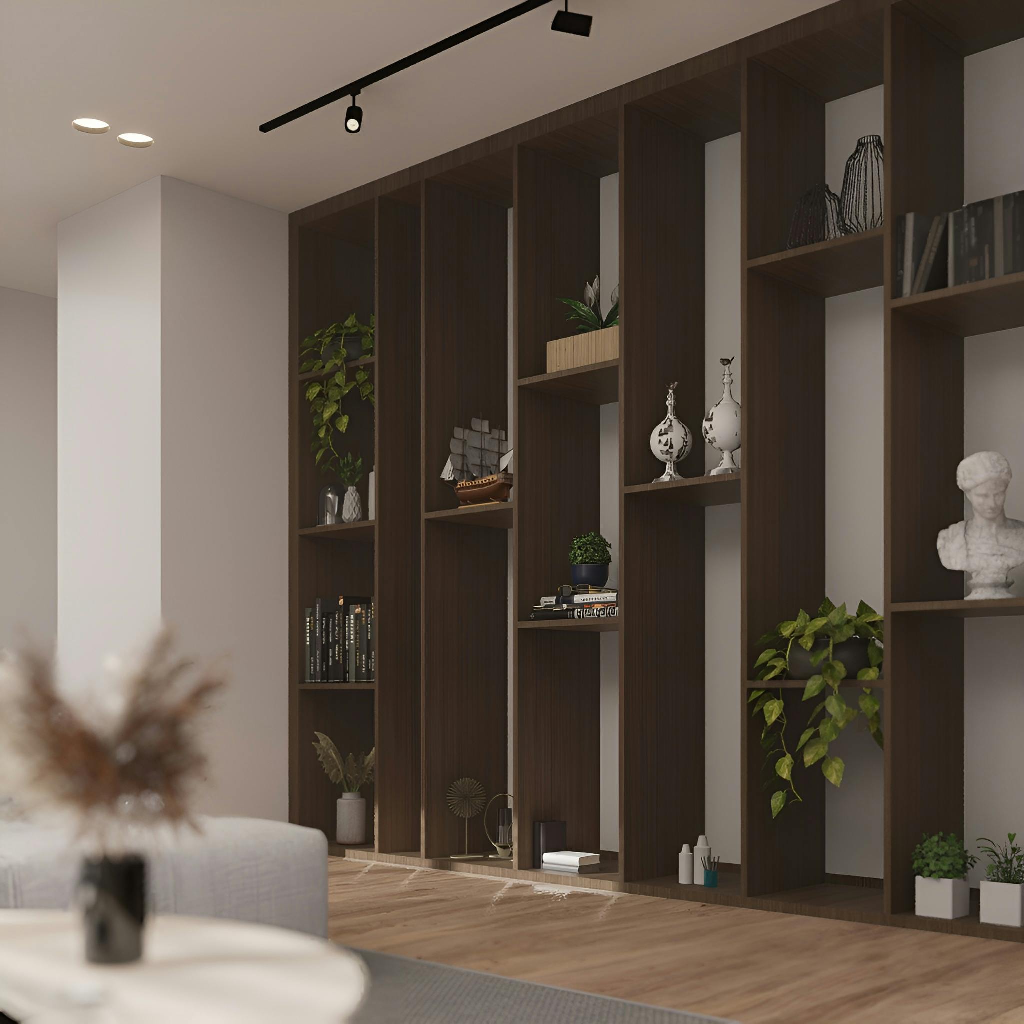 Stylish living room with sleek wooden shelves featuring books, plants, and decor.