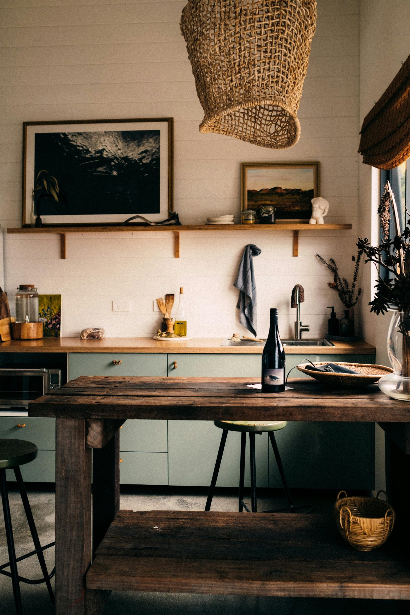 Warm, rustic kitchen interior with wooden accents and vintage decor elements.