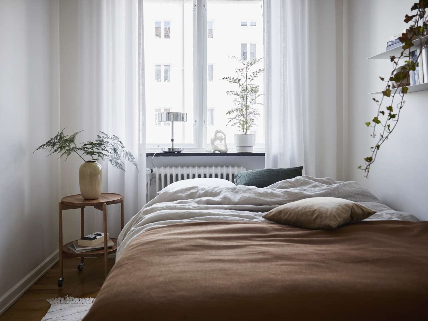 7 Ways to Style a Small Bedroom When Your Bed Takes Up Most of the Space