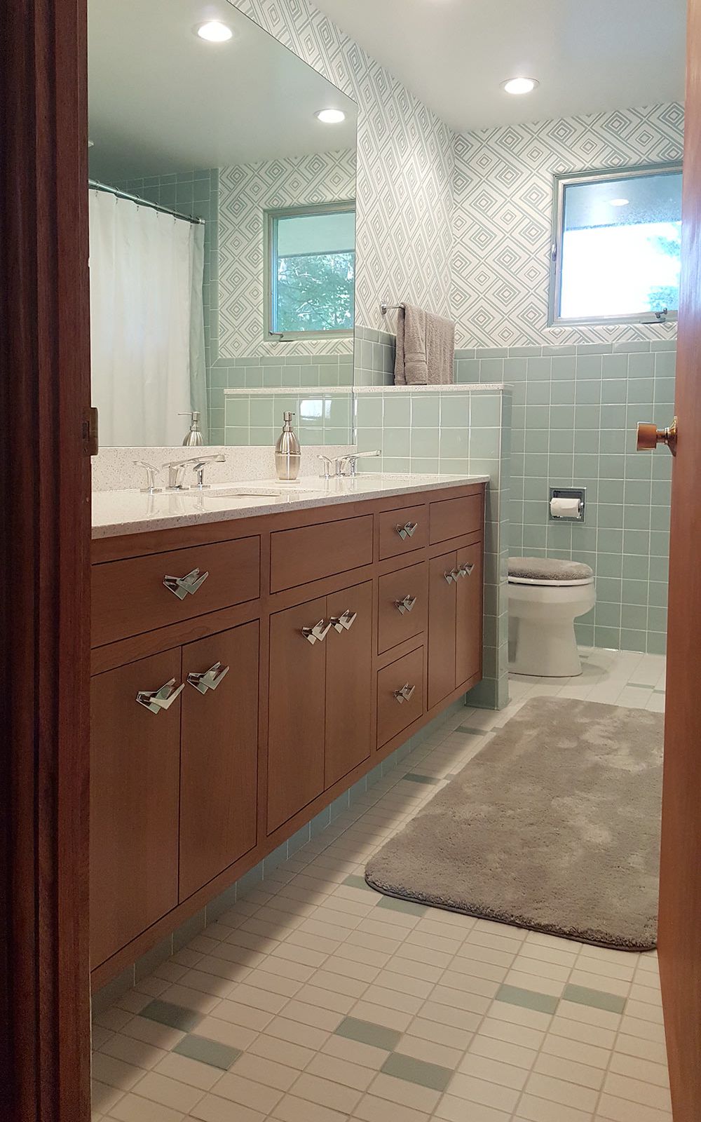 A new blue bathroom for a 1955 house that looks like it's always been there